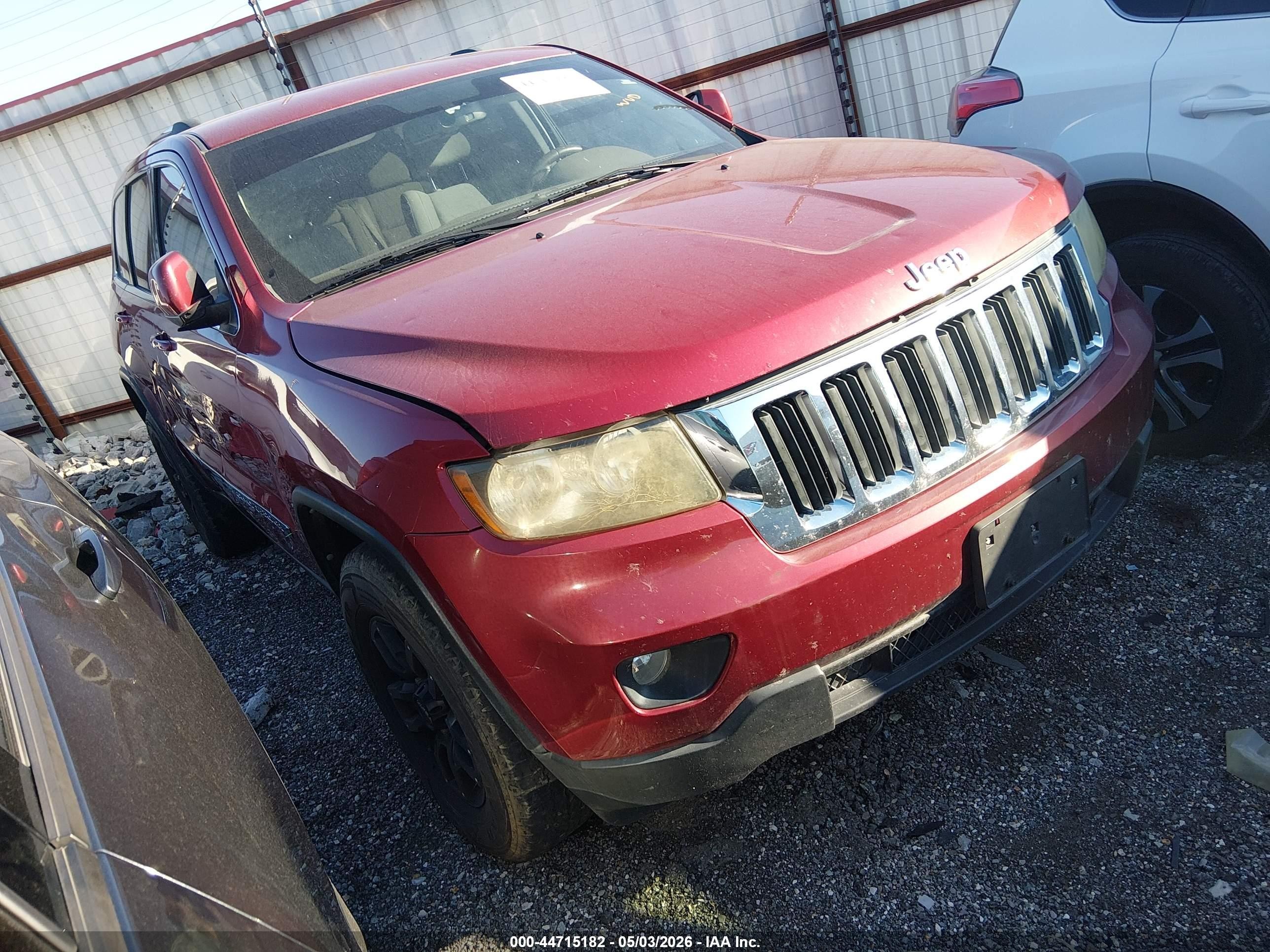 2013 Jeep Grand Cherokee Laredo, VIN 1C4RJFAG4DC555914 — Side
