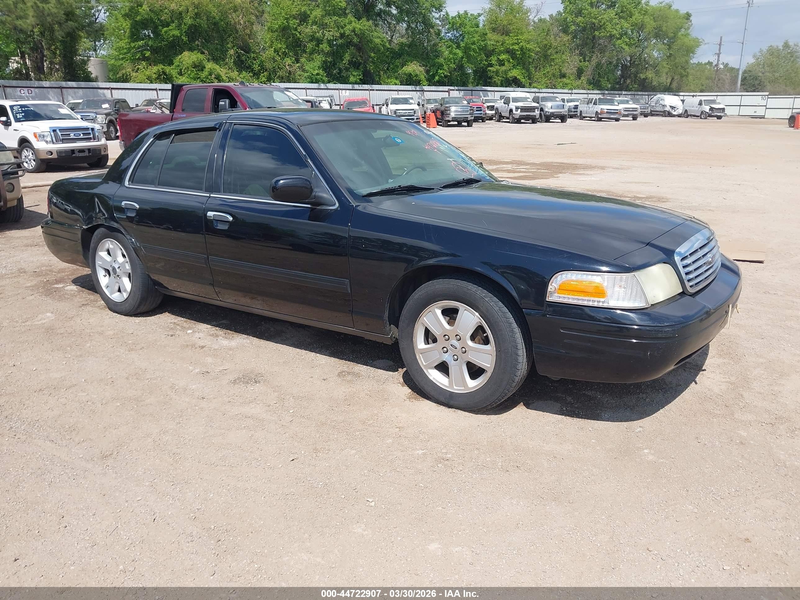 2011 Ford Crown Victoria LX, VIN 2FABP7EV7BX184560 — Side