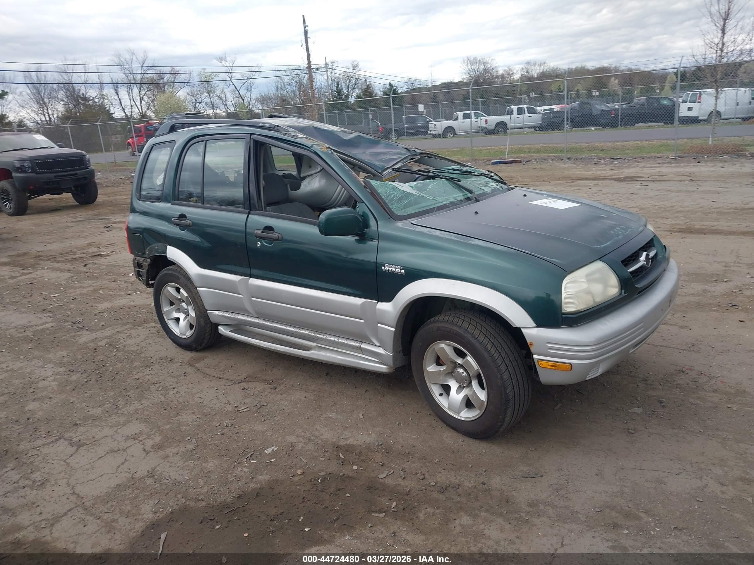 2000 Suzuki Grand Vitara JLX, VIN JS3TD62V1Y4116181 — Rollover