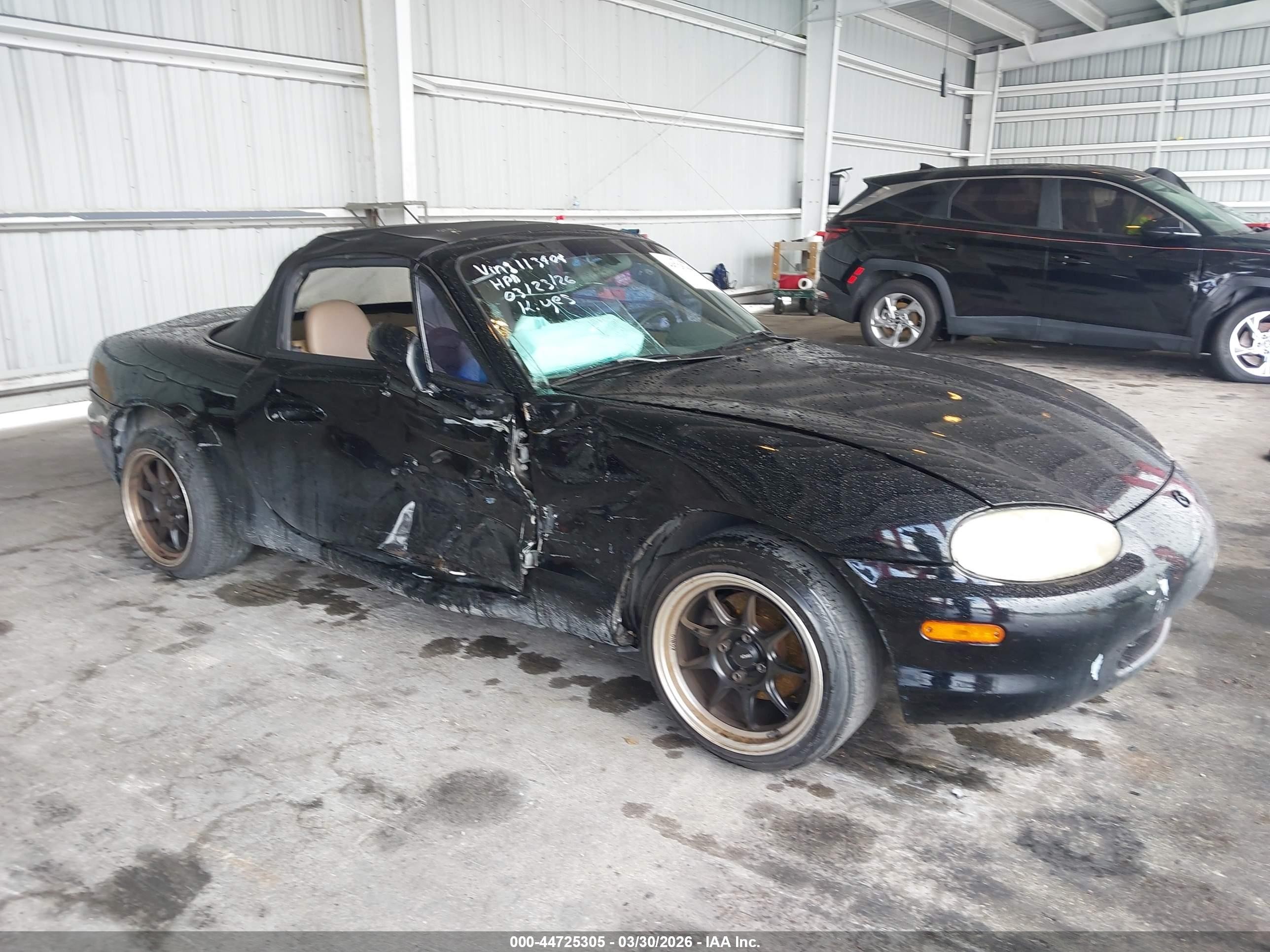1999 Mazda MX-5 Miata, VIN JM1NB3538X0113404 — Side