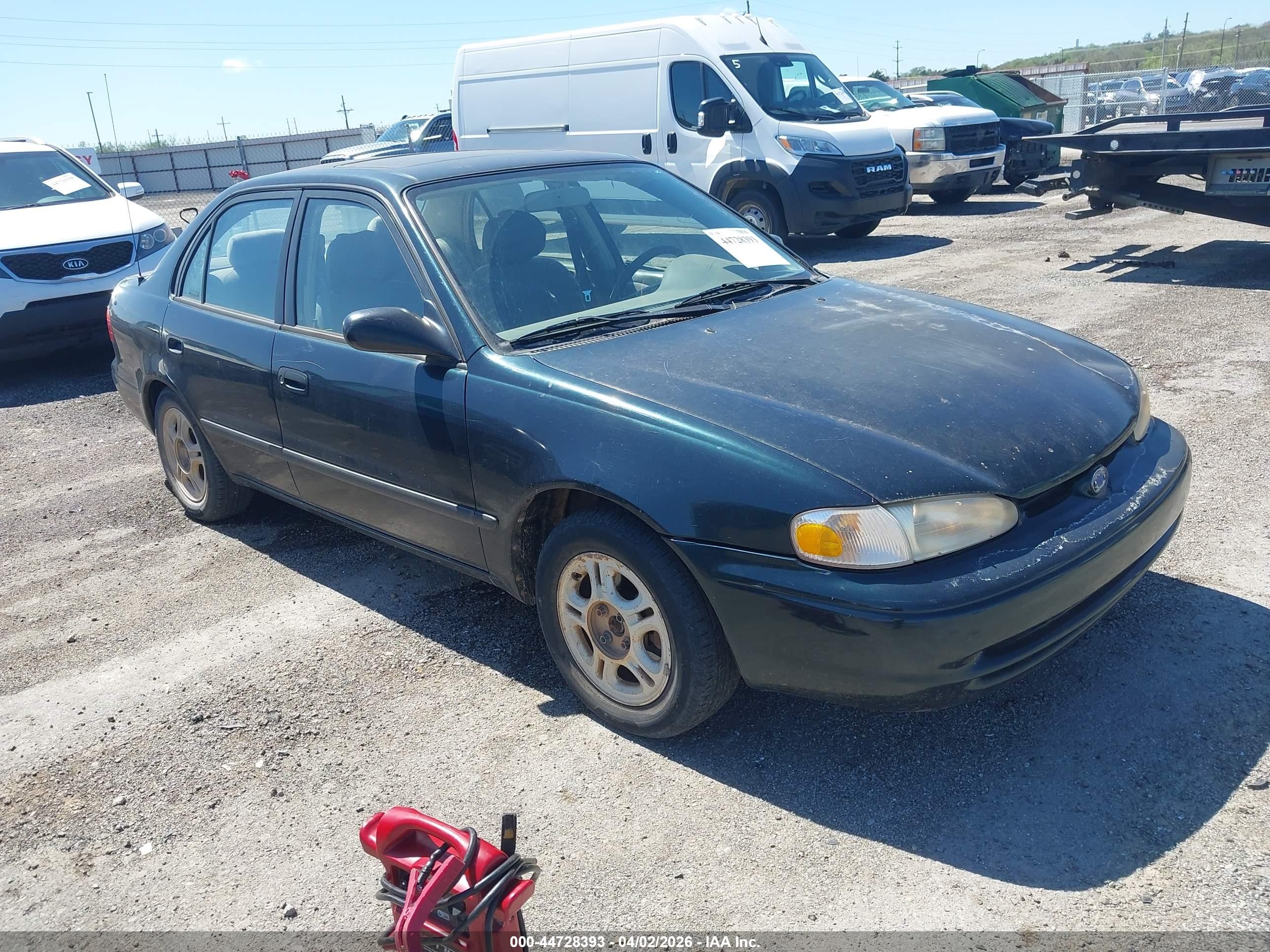 1998 Chevrolet Prizm Lsi, VIN 1Y1SK5485WZ444961 — Side