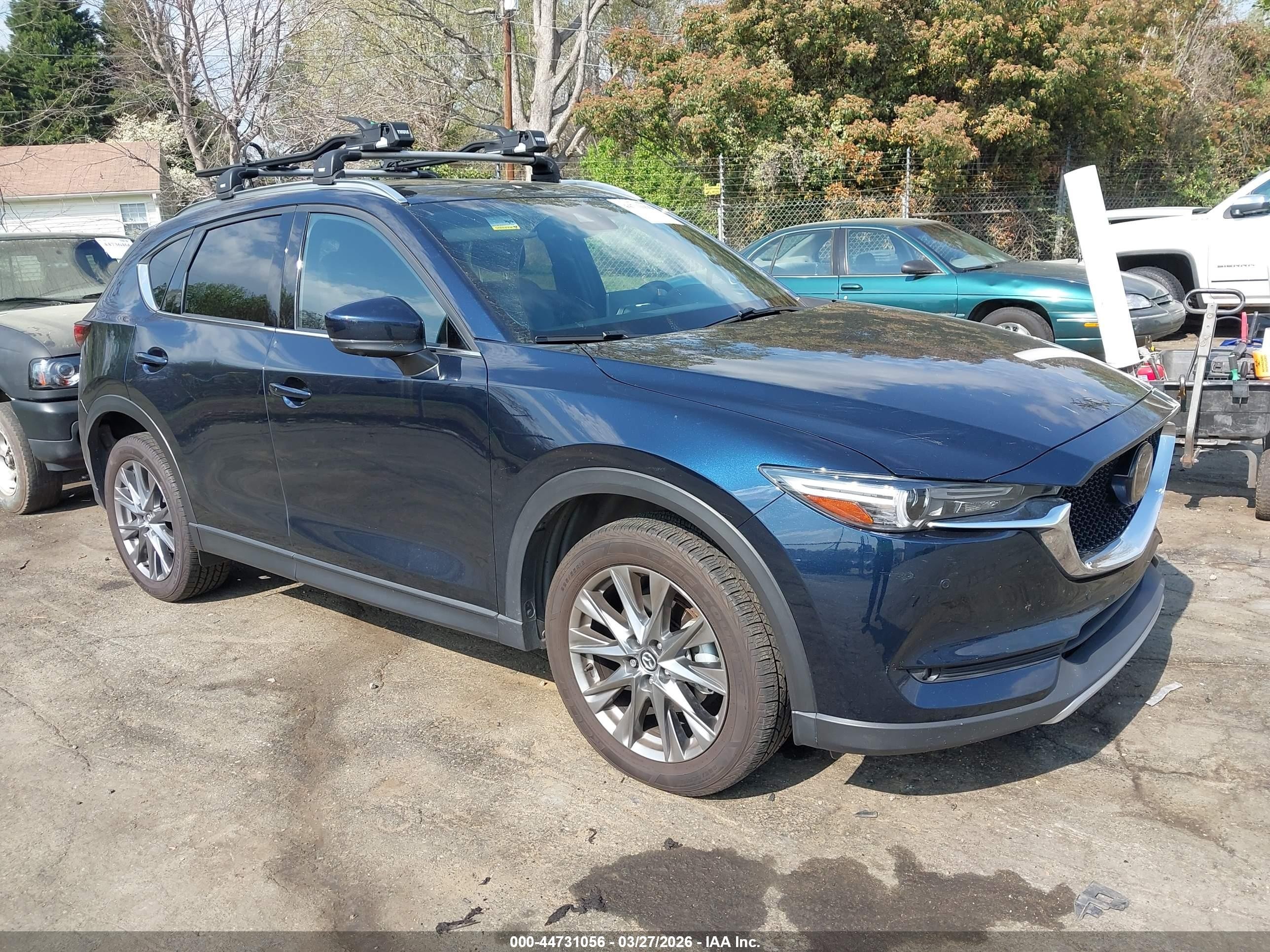 2021 Mazda CX-5 Signature, VIN JM3KFBEY4M0390499 — Rear end