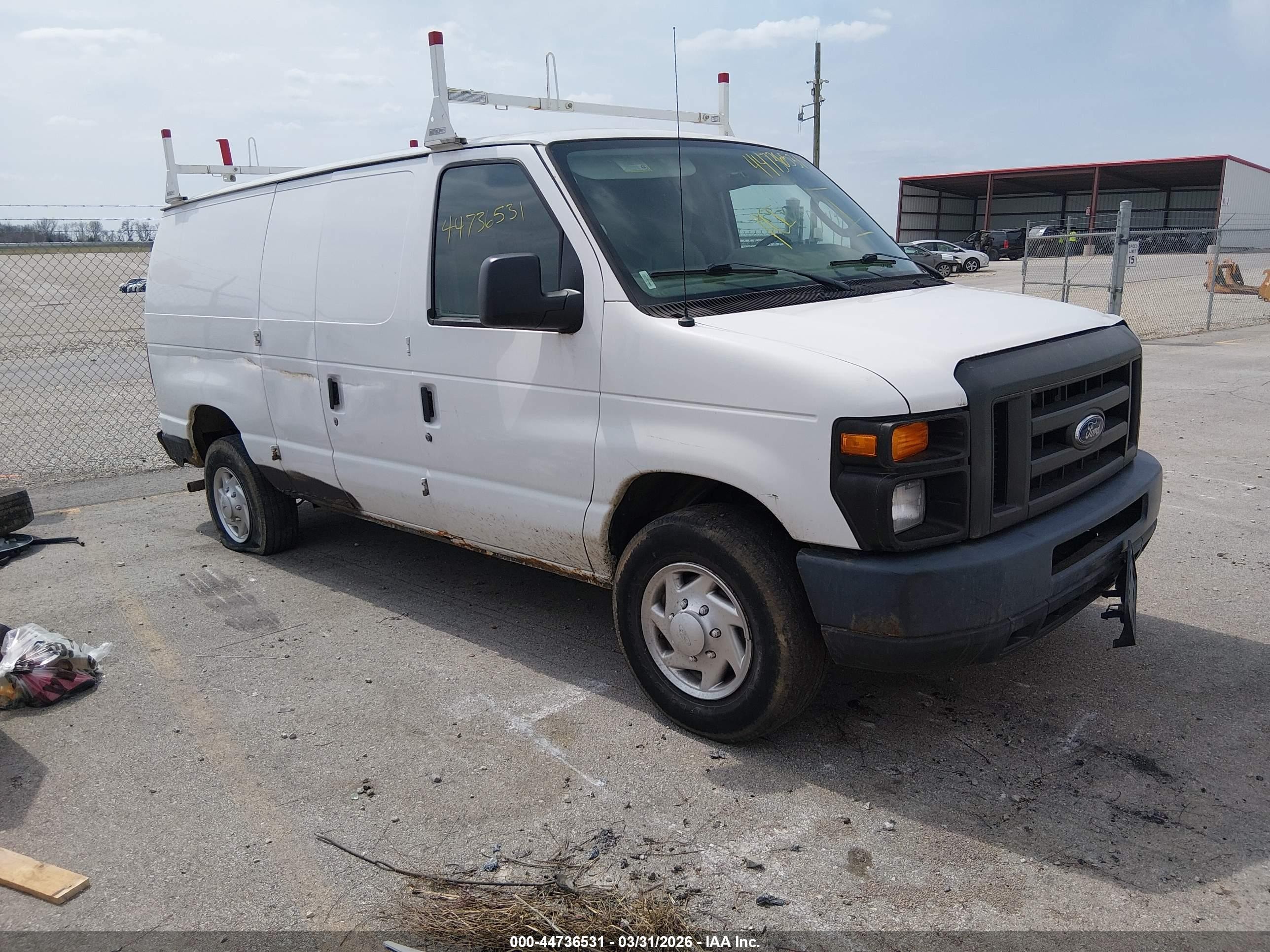 2013 Ford Econoline Cargo Commercial, VIN 1FTNE2EW2DDA14223 — Side