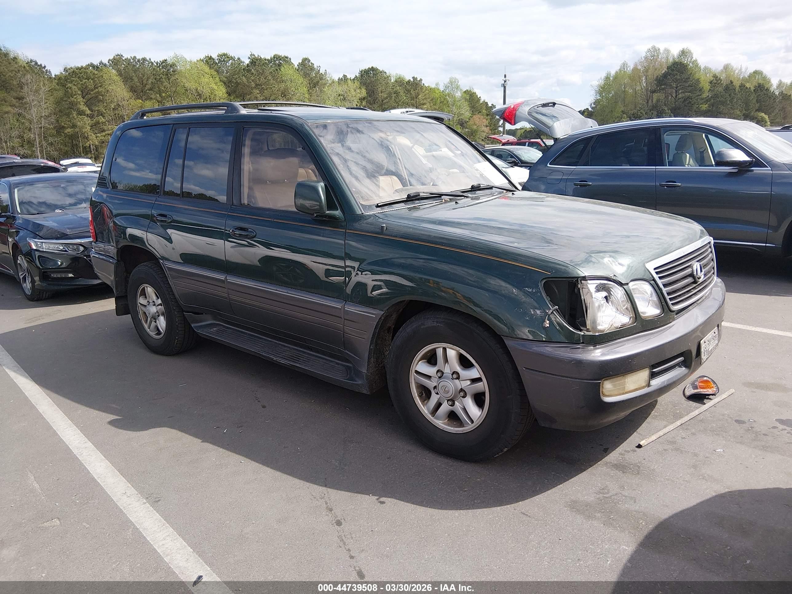 1999 Lexus LX 470, VIN JT6HT00W6X0030913 — Front end
