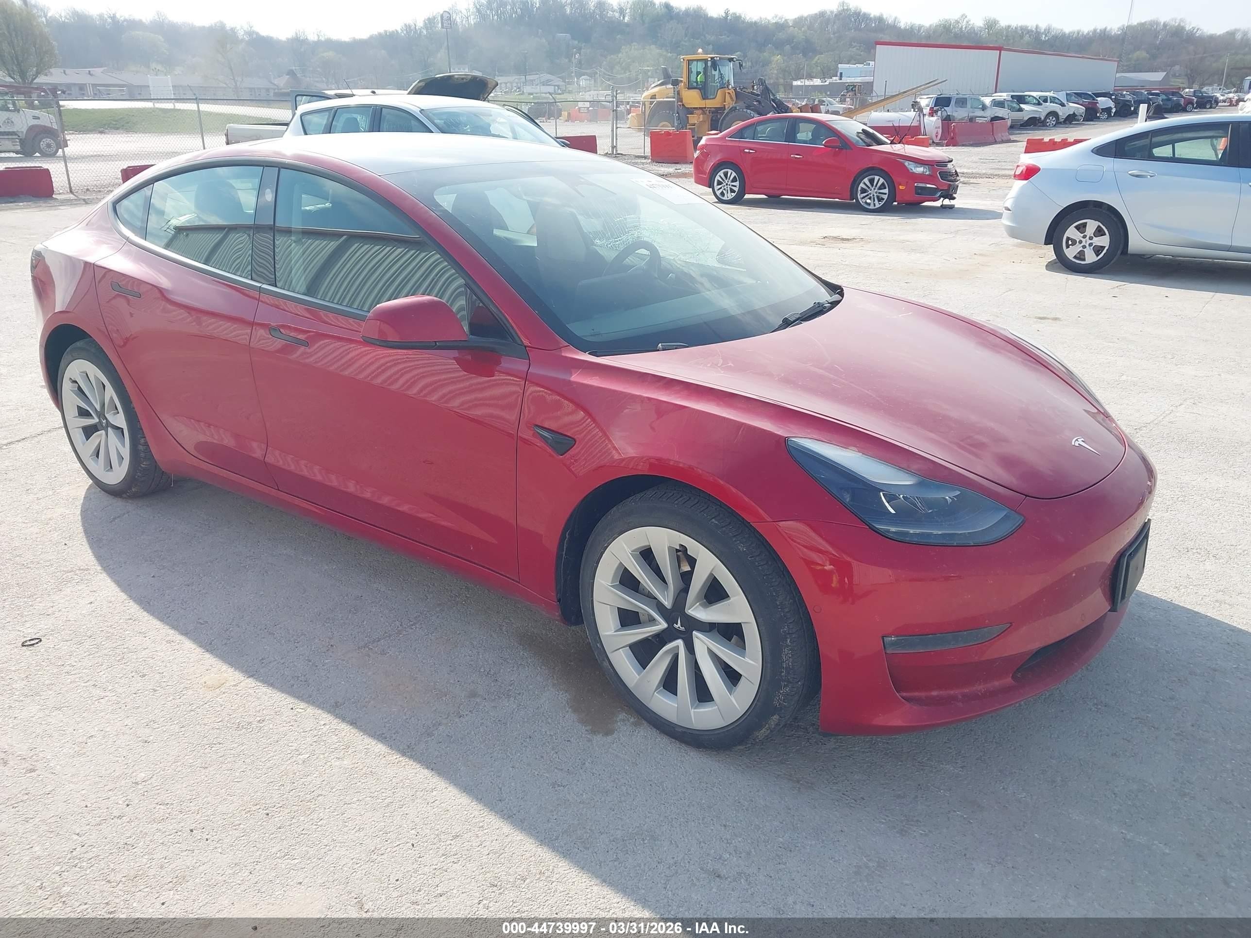 2022 Tesla Model 3 Long Range, VIN 5YJ3E1EB9NF360813 — Side