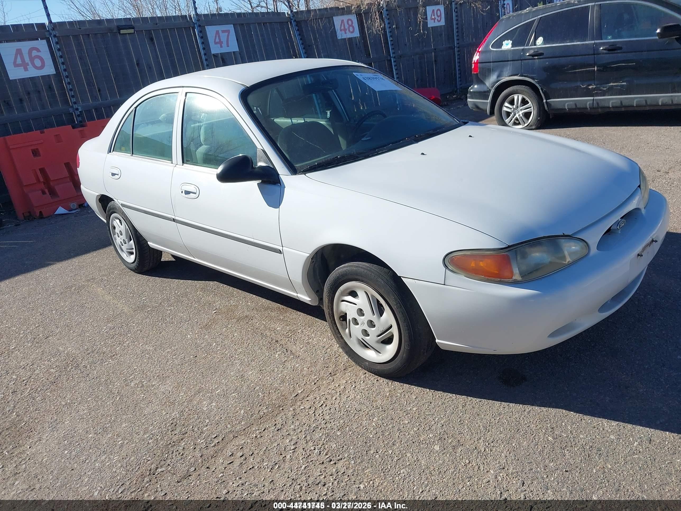 1999 Ford Escort LX, VIN 1FAFP10P8XW221545 — Hail