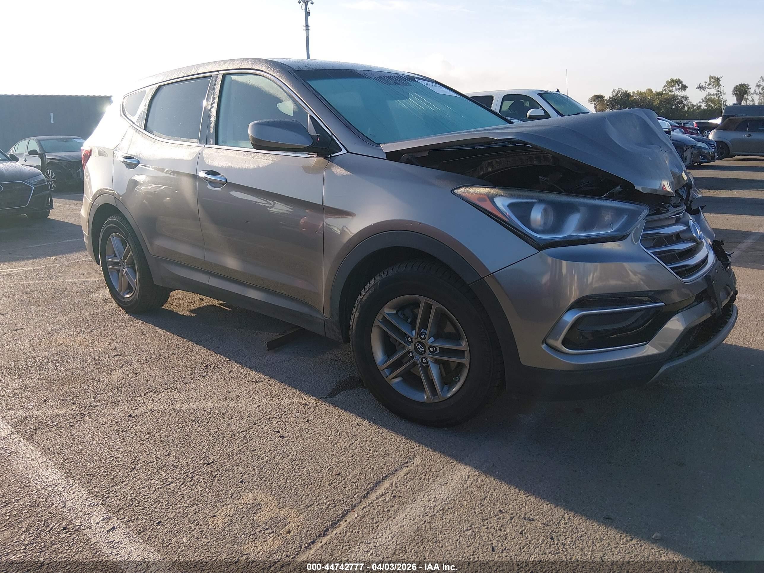 2017 Hyundai Santa Fe 2.4L, VIN 5NMZTDLB8HH002092 — Front end