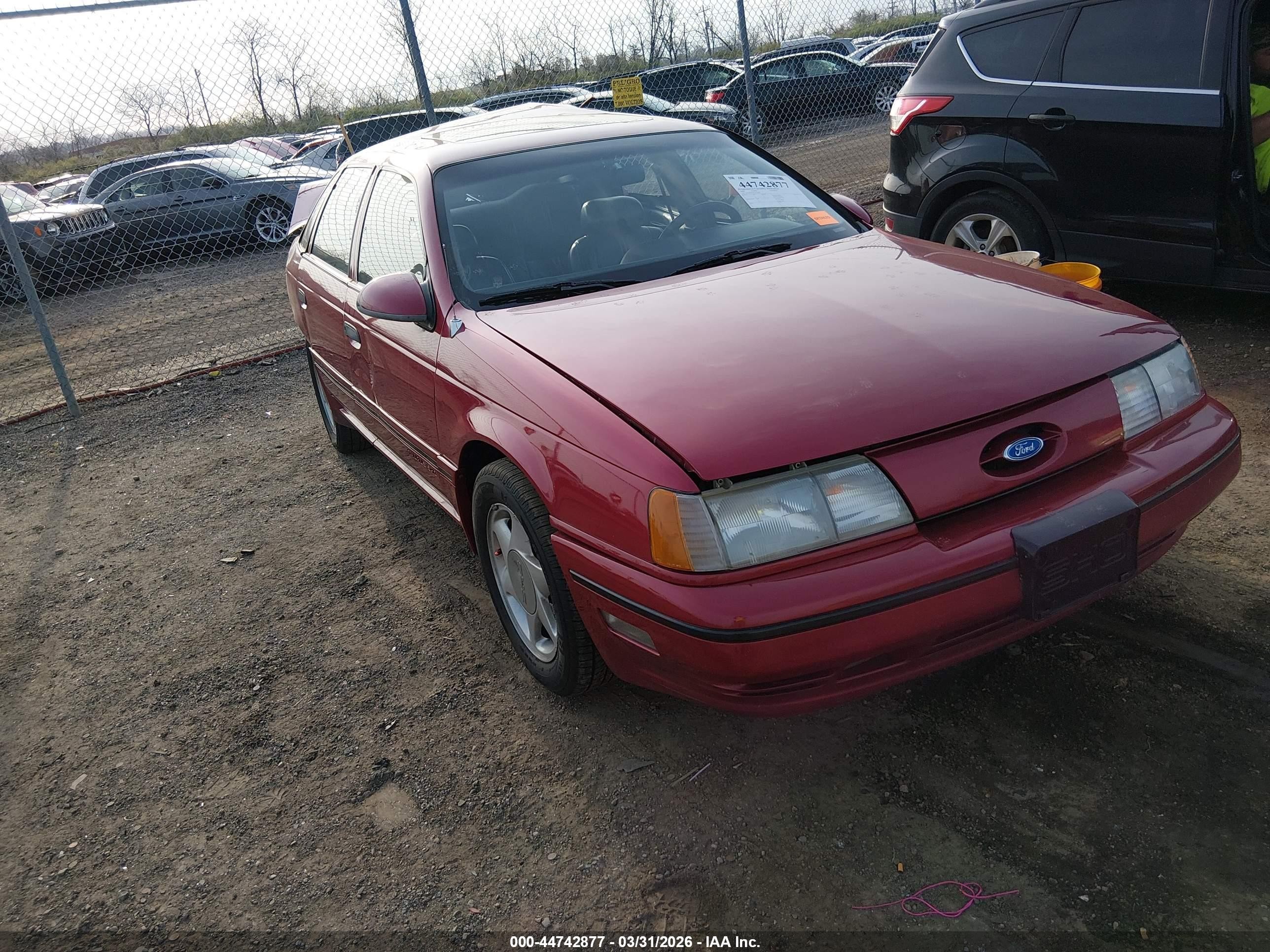 1990 Ford Taurus, VIN 1FACP54Y0LA234293 — Зад