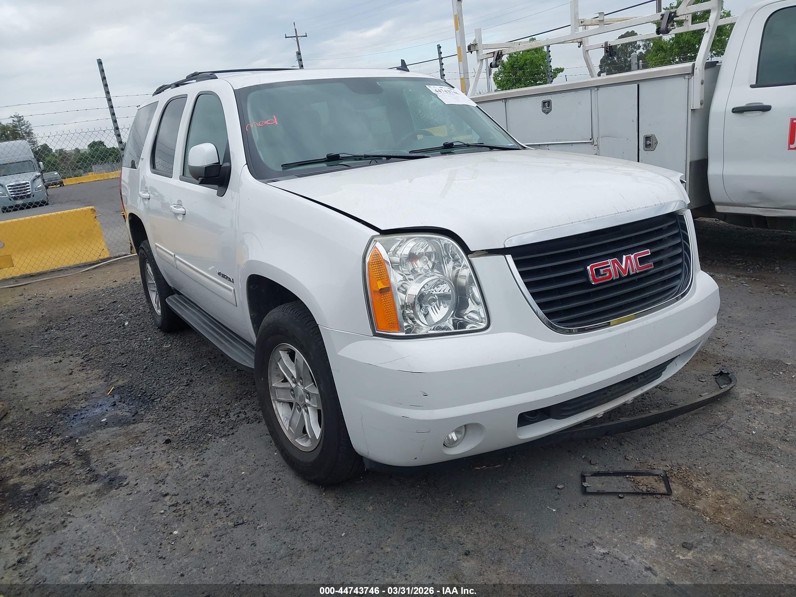 2014 GMC Yukon SLT, VIN 1GKS1CE07ER123043 — Theft recovery
