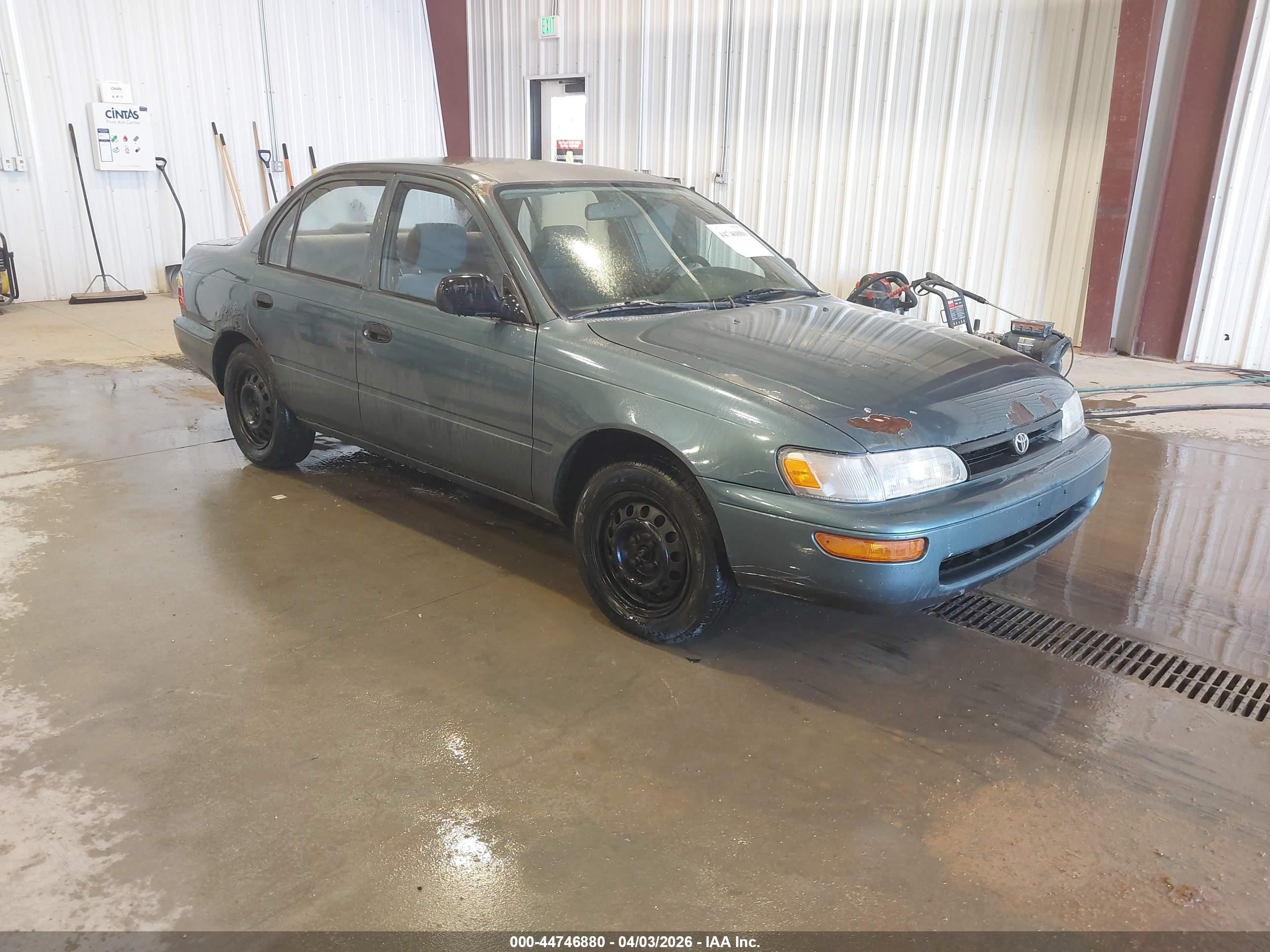 1995 Toyota Corolla, VIN 1NXAE04B2SZ316380 — Side