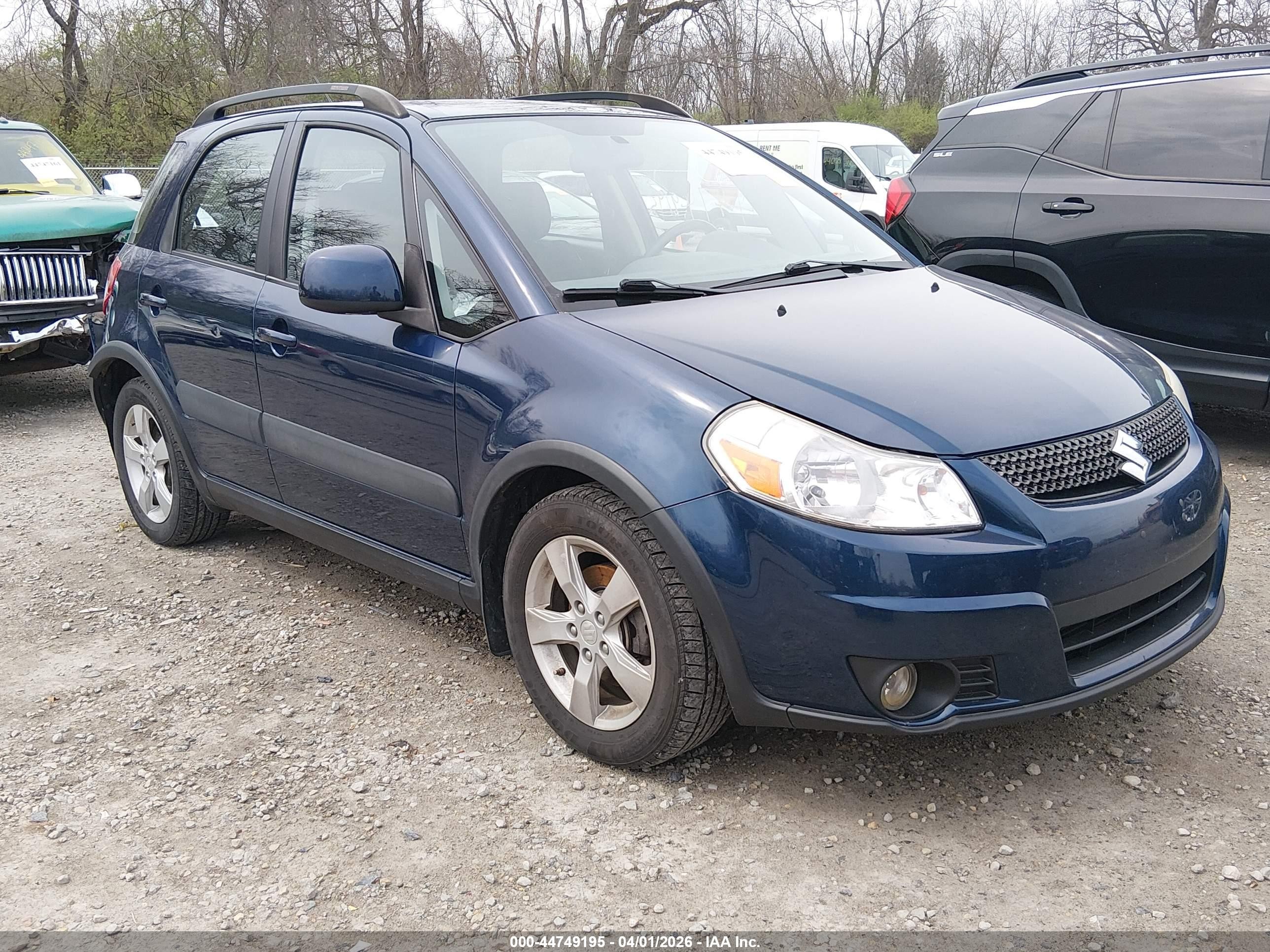 2011 Suzuki SX4 Crossover, VIN JS2YB5A35B6301596 — Зад