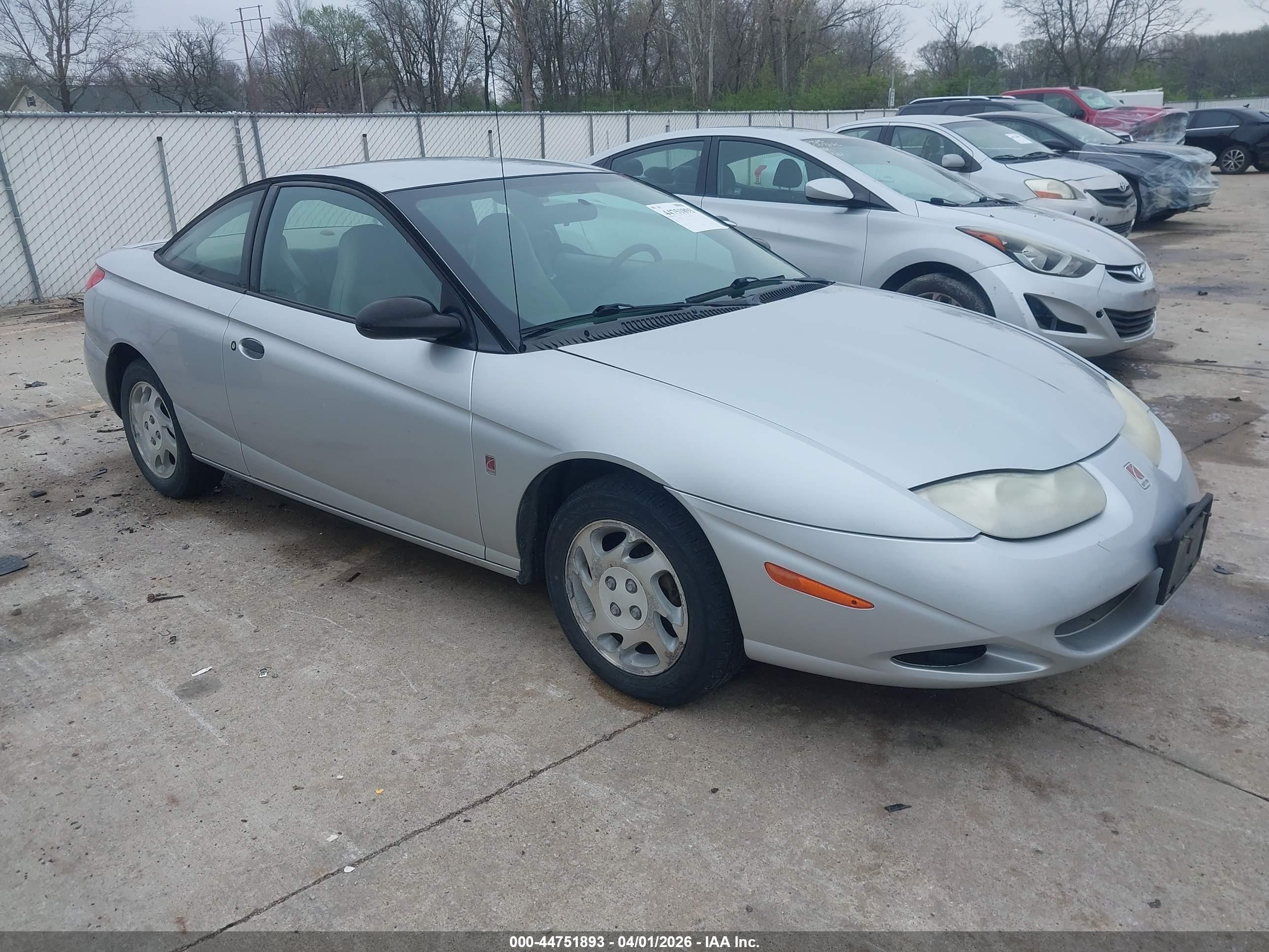 2002 Saturn SC, VIN 1G8ZP148X2Z184736 — Normal wear