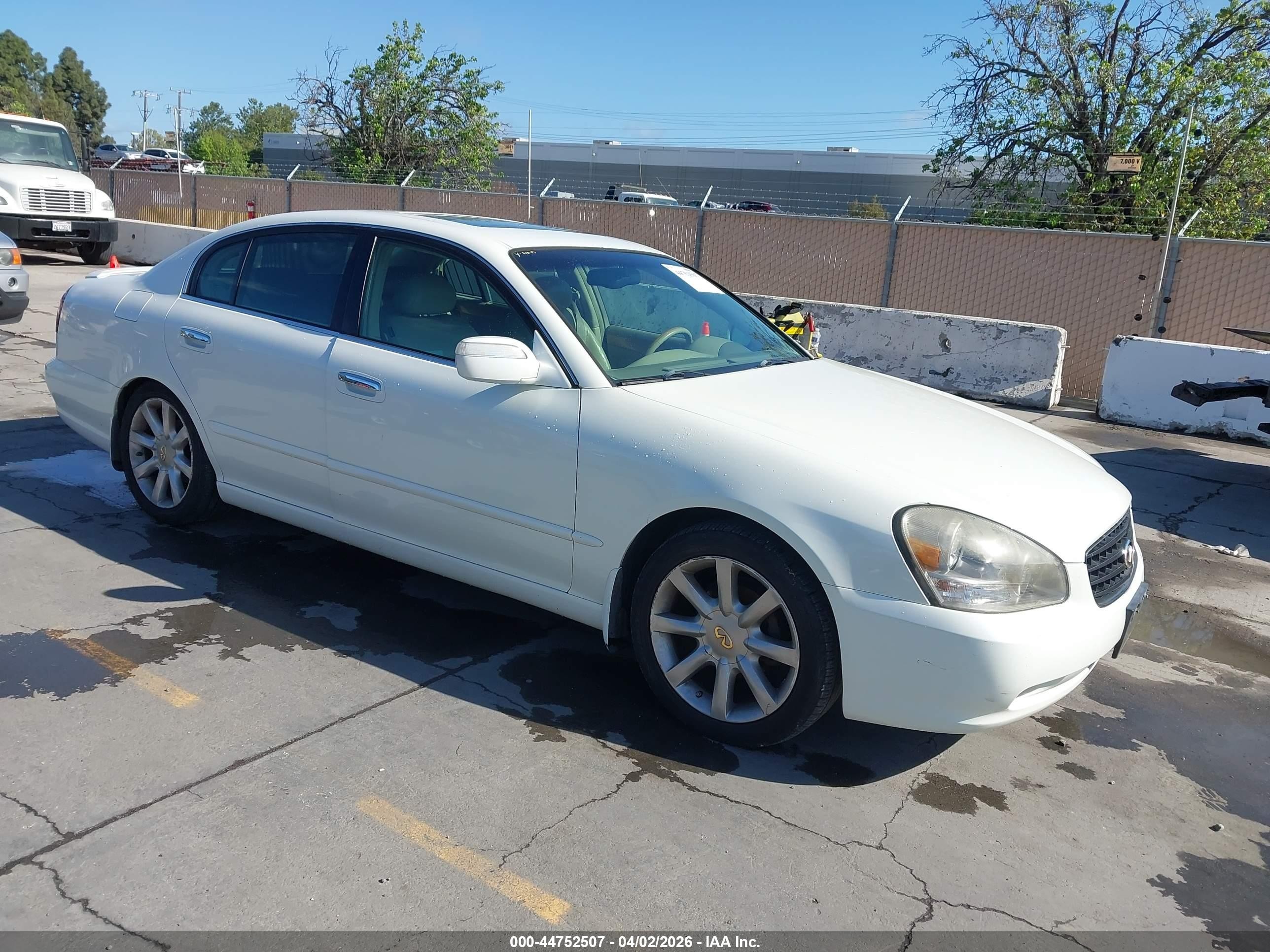 2002 Infiniti Q45, VIN JNKBF01A52M003615 — Rear end