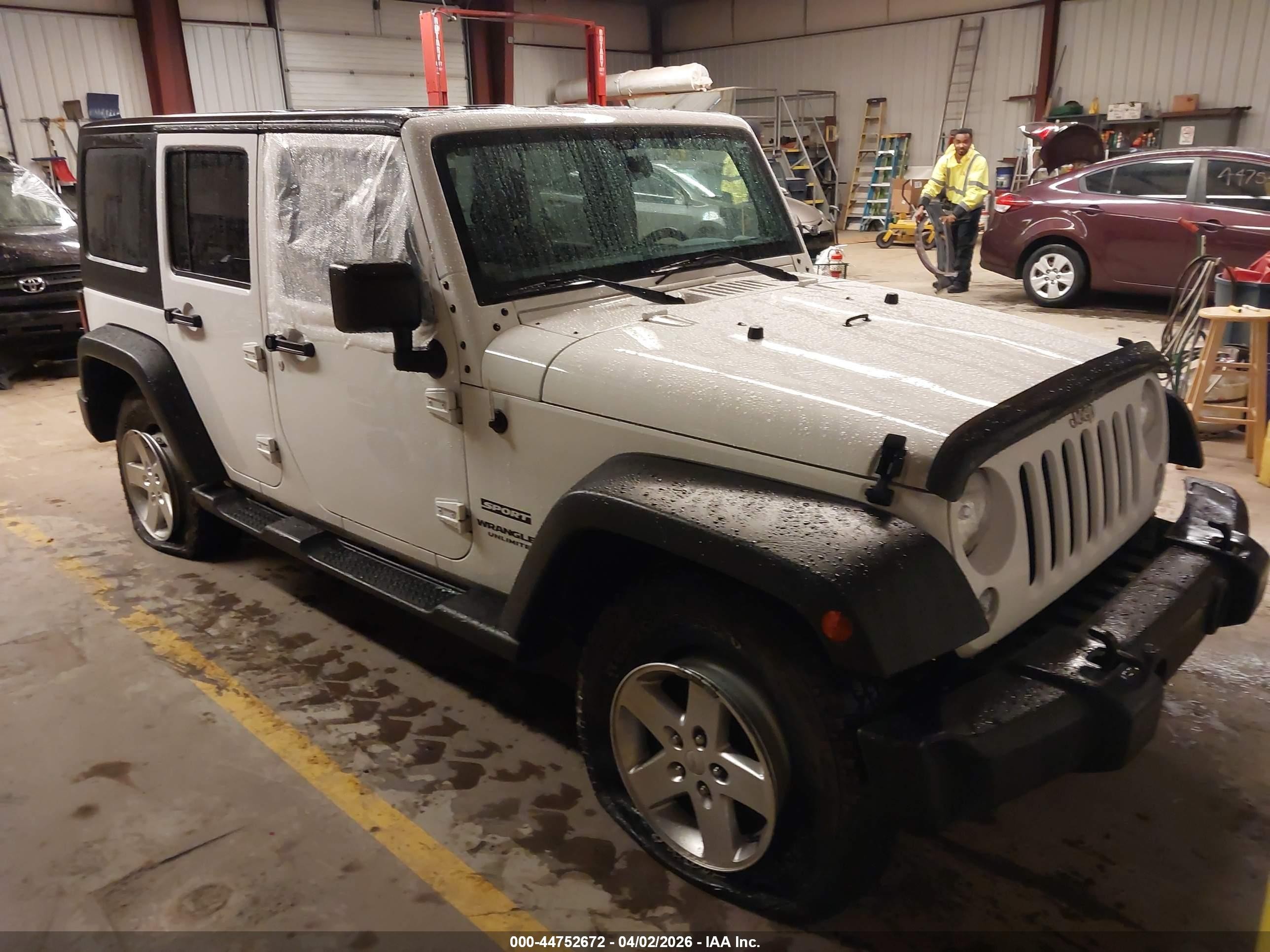2015 Jeep Wrangler Unlimited Sport, VIN 1C4BJWDG9FL576435 — Vandalism
