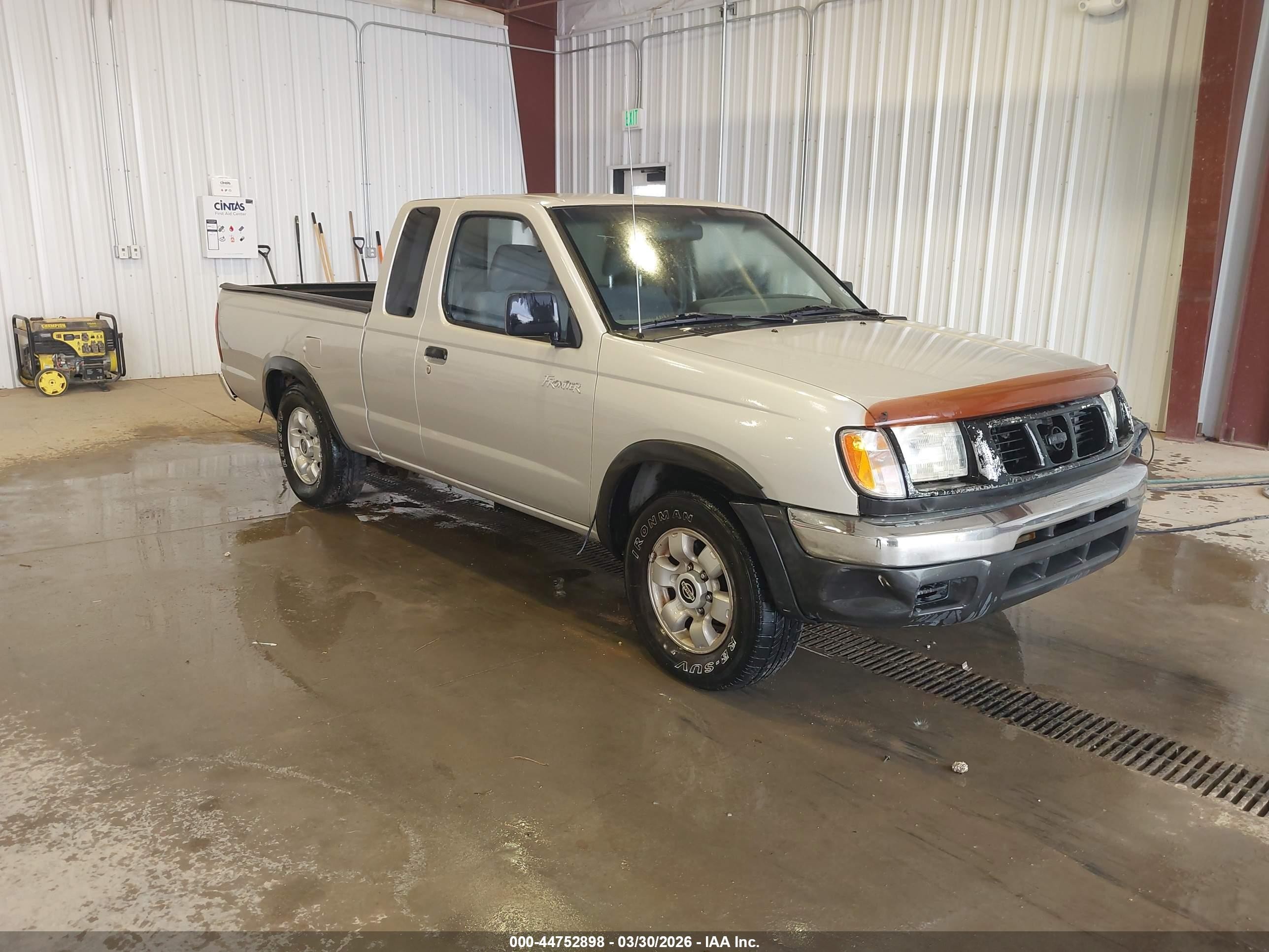 1999 Nissan Frontier XE, VIN 1N6DD26S8XC317234 — Side