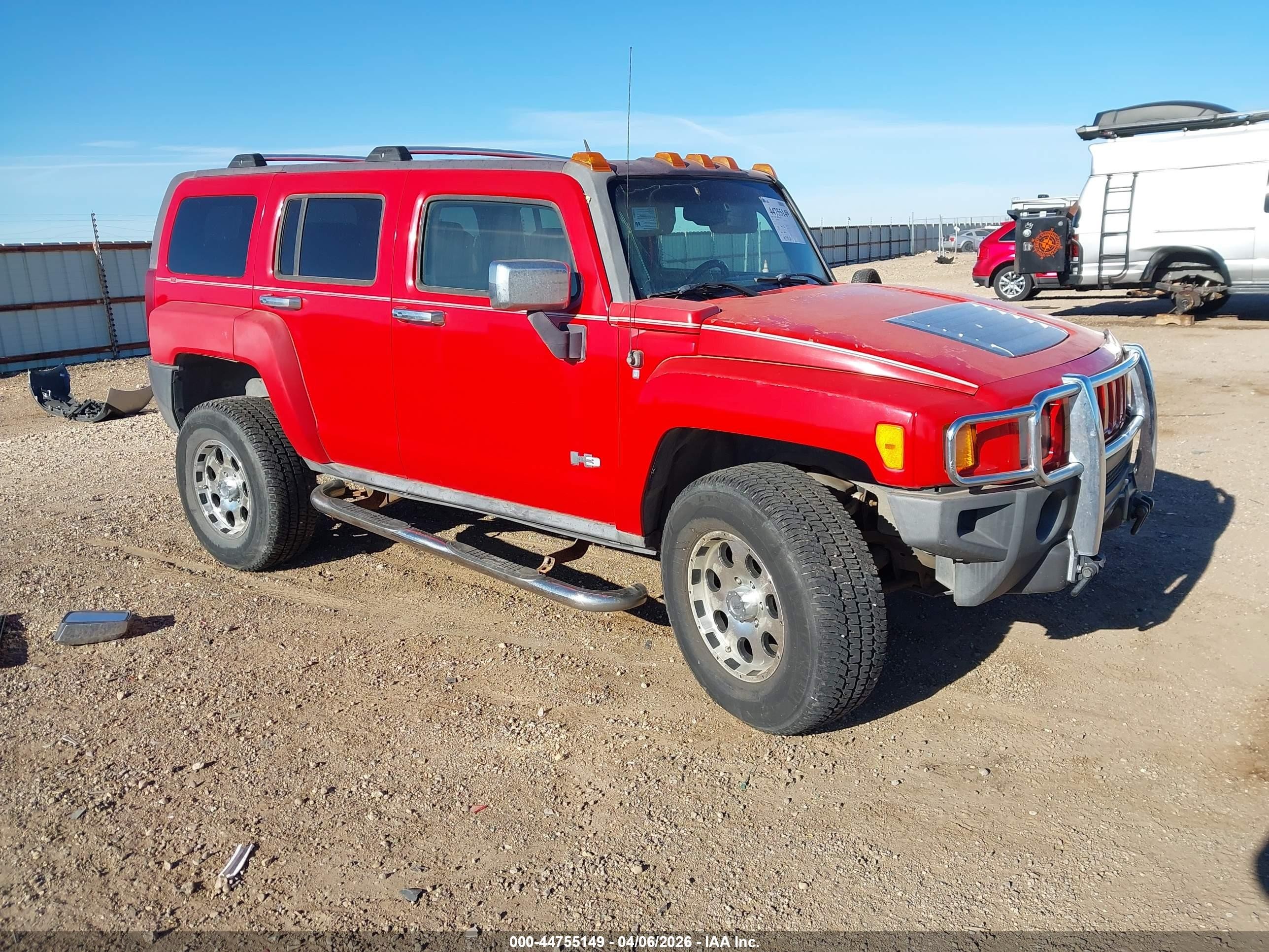 2007 Hummer H3 SUV, VIN 5GTDN13E578190916 — Бок