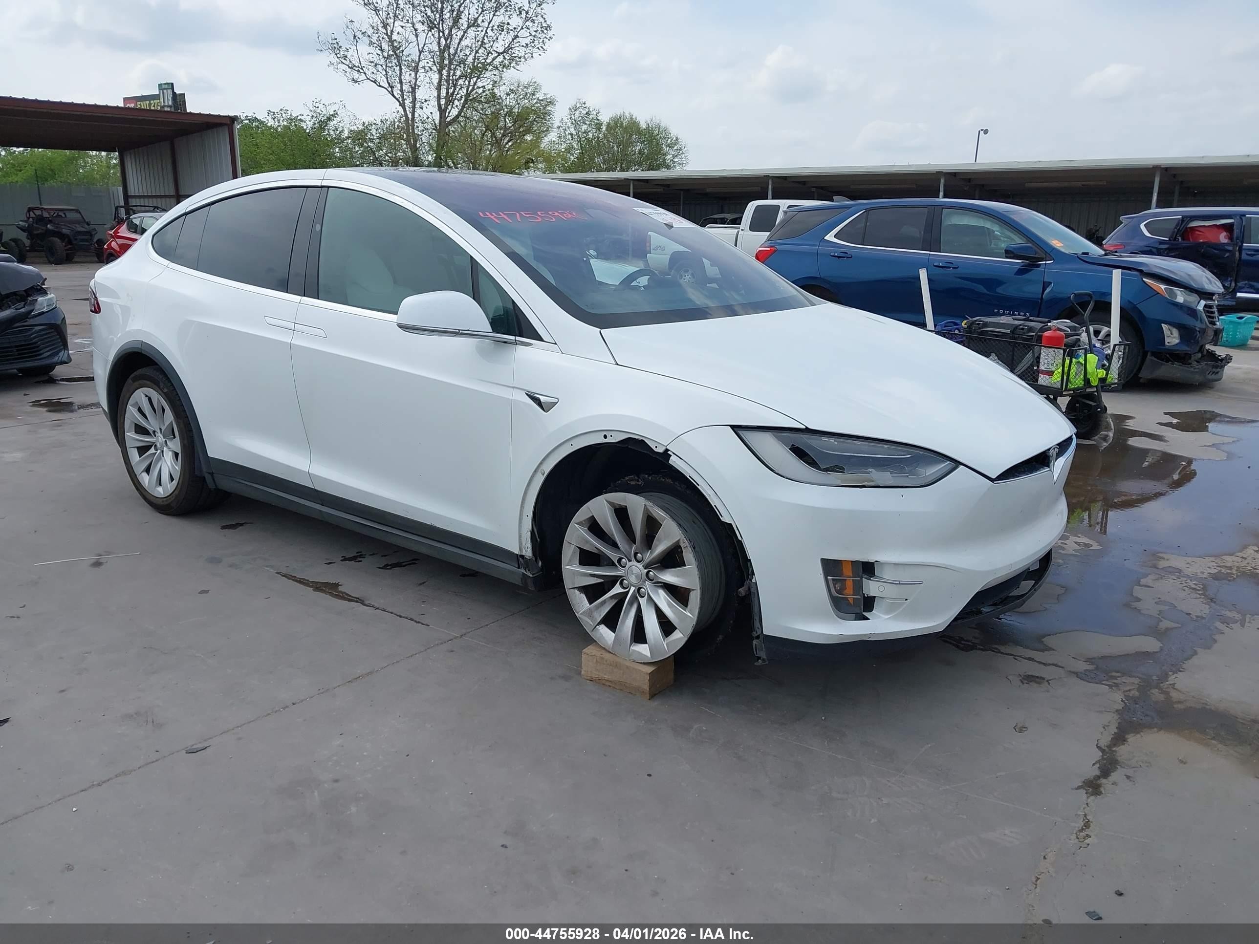 2019 Tesla Model X 75D, VIN 5YJXCAE23KF160545 — Undercarriage