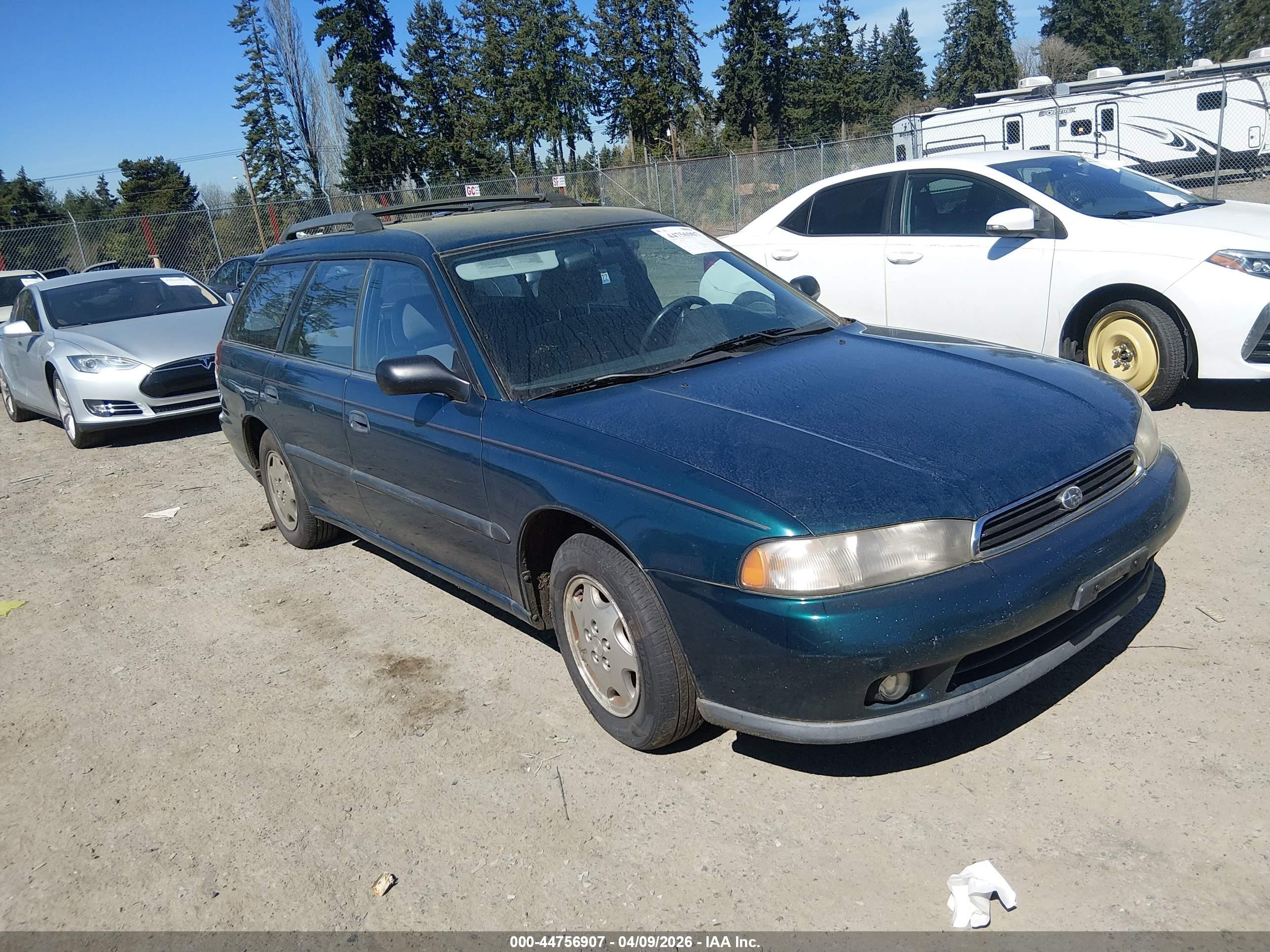 1997 Subaru Legacy L, VIN 4S3BK4356V6313303 — Зад