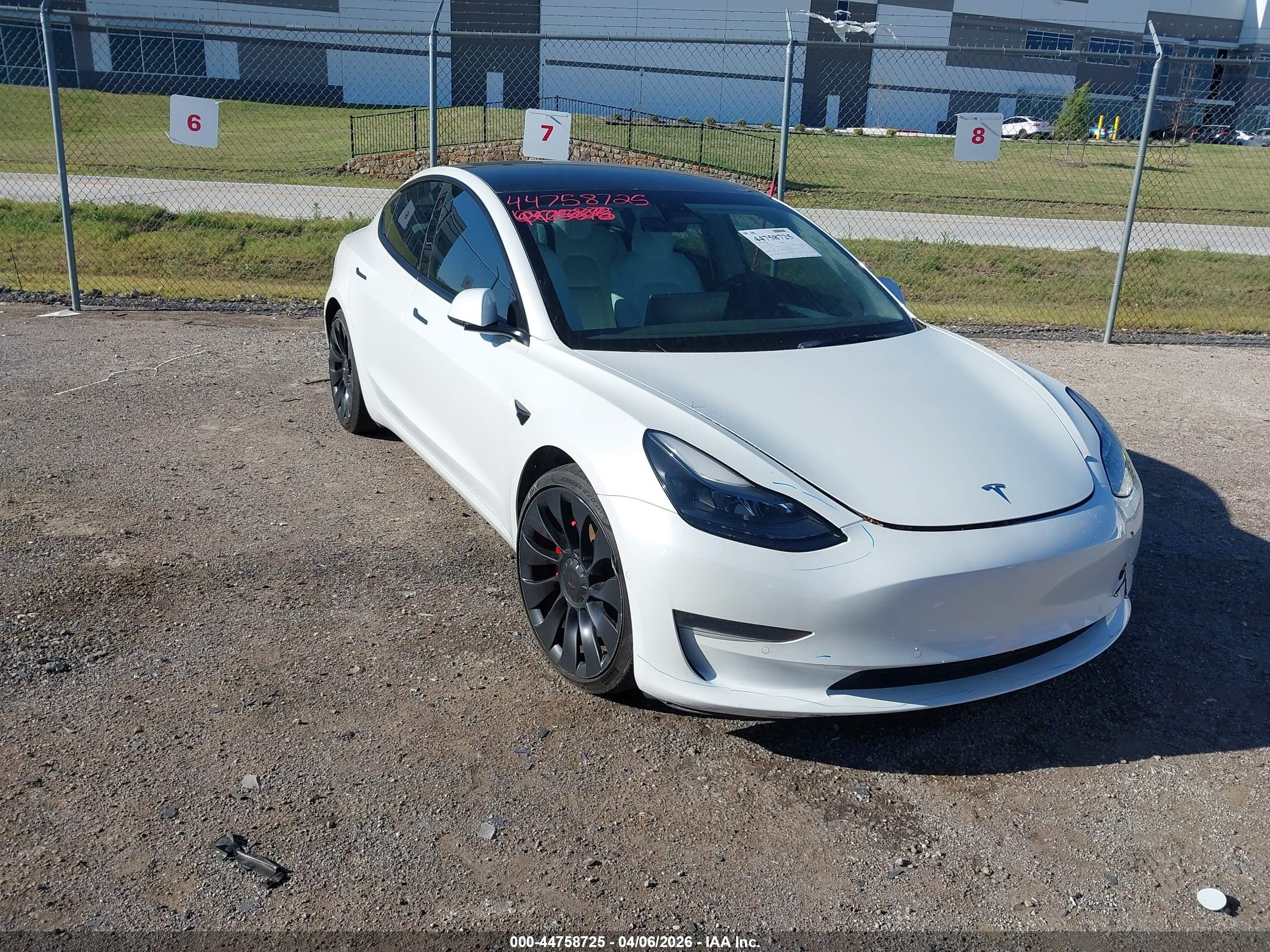 2022 Tesla Model 3 Performance, VIN 5YJ3E1EC6NF278899 — Not stated