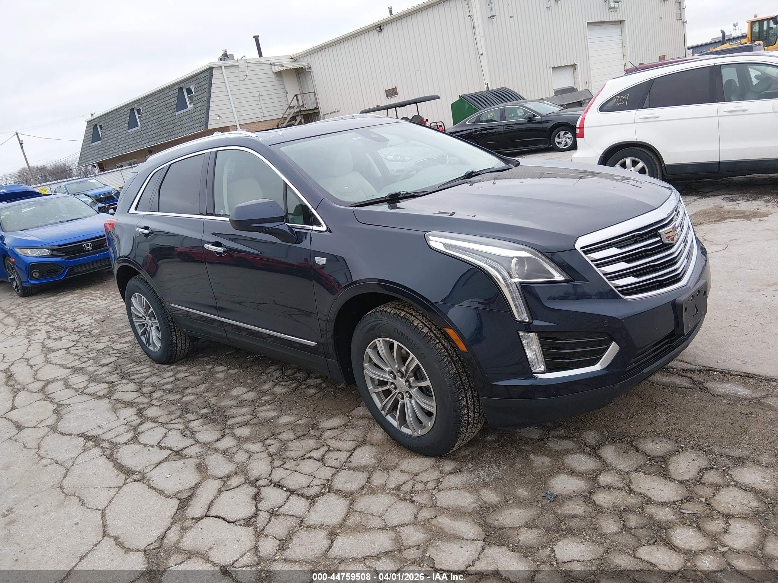 2017 Cadillac XT5 Luxury FWD, VIN 1GYKNBRS7HZ274002 — Крыша
