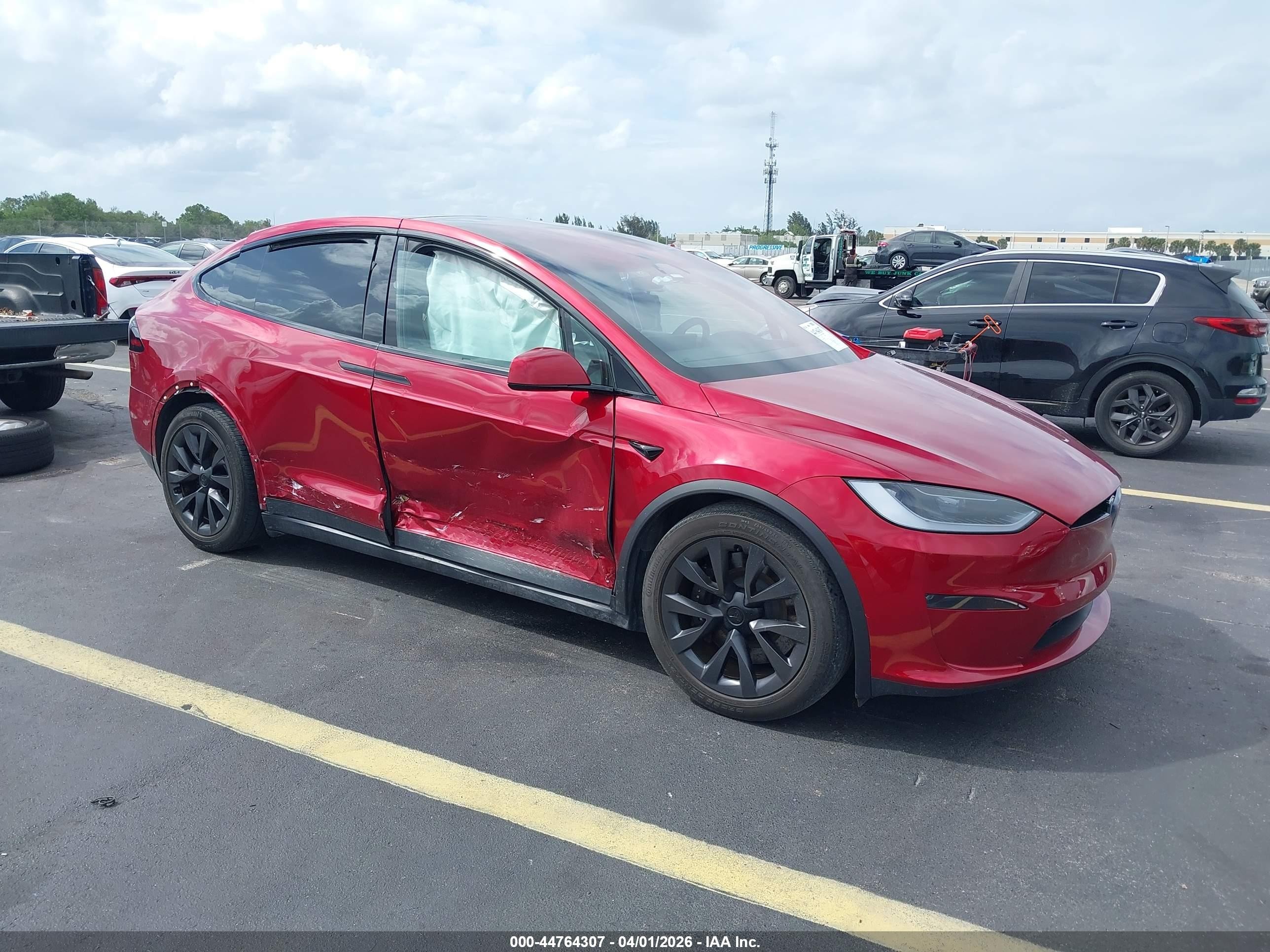 2024 Tesla Model X, VIN 7SAXCBE58RF440572 — Side