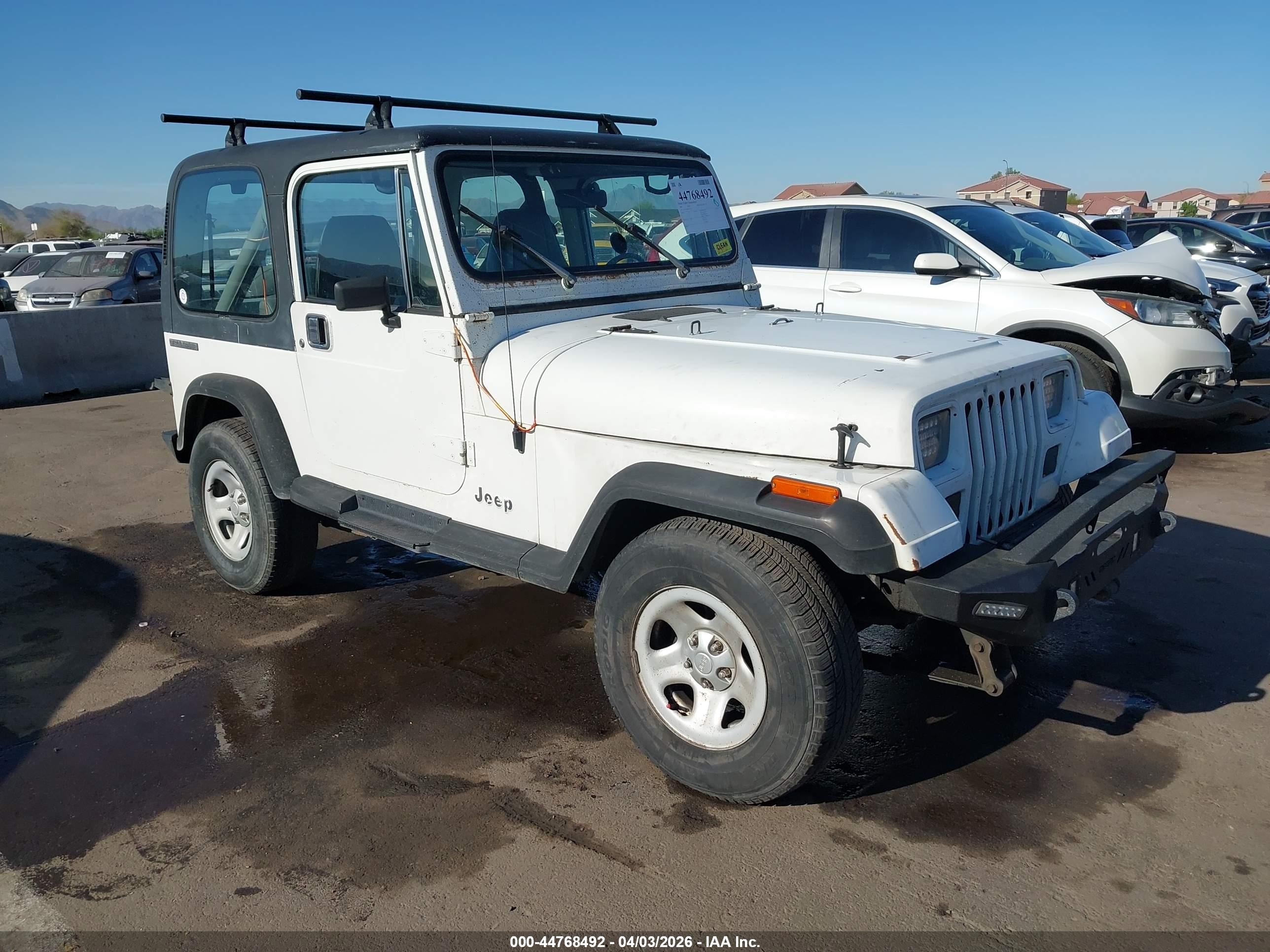 1989 Jeep Wrangler, VIN 2J4FY29T8KJ143341 — Rear end
