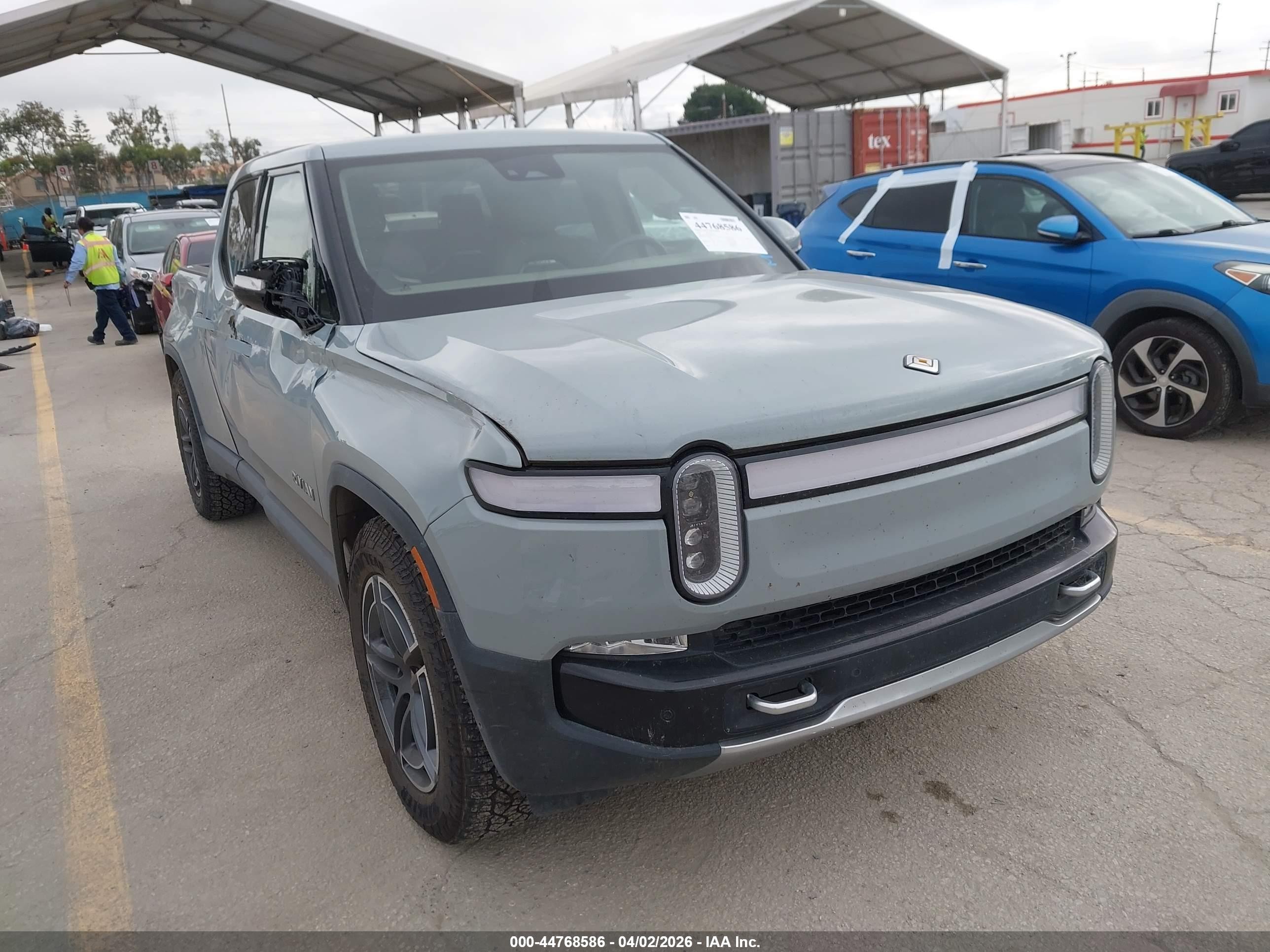 2023 Rivian R1T Adventure, VIN 7FCTGBAA6PN026914 — Side