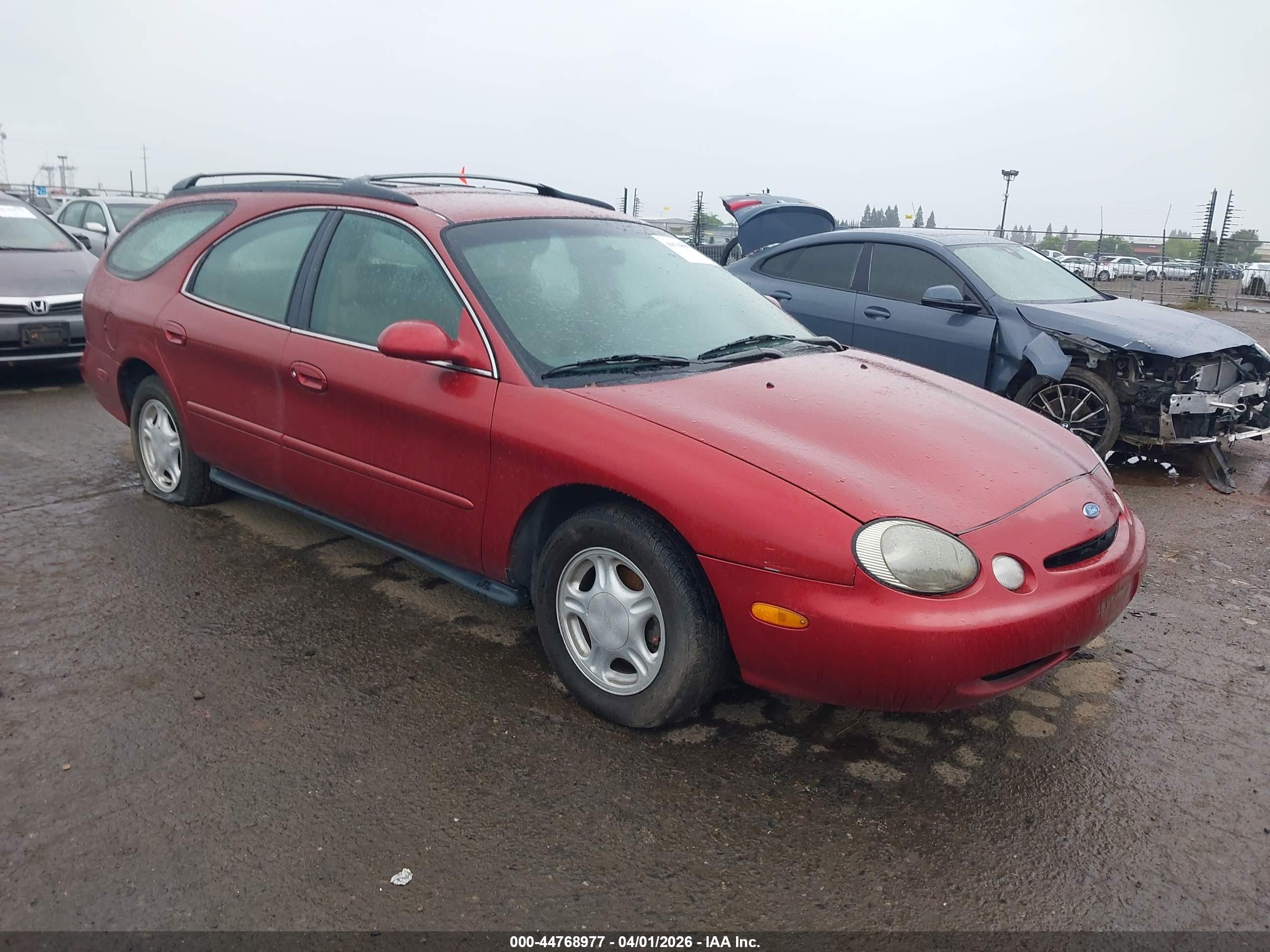 1997 Ford Taurus GL, VIN 1FALP57U7VG213949 — Front end