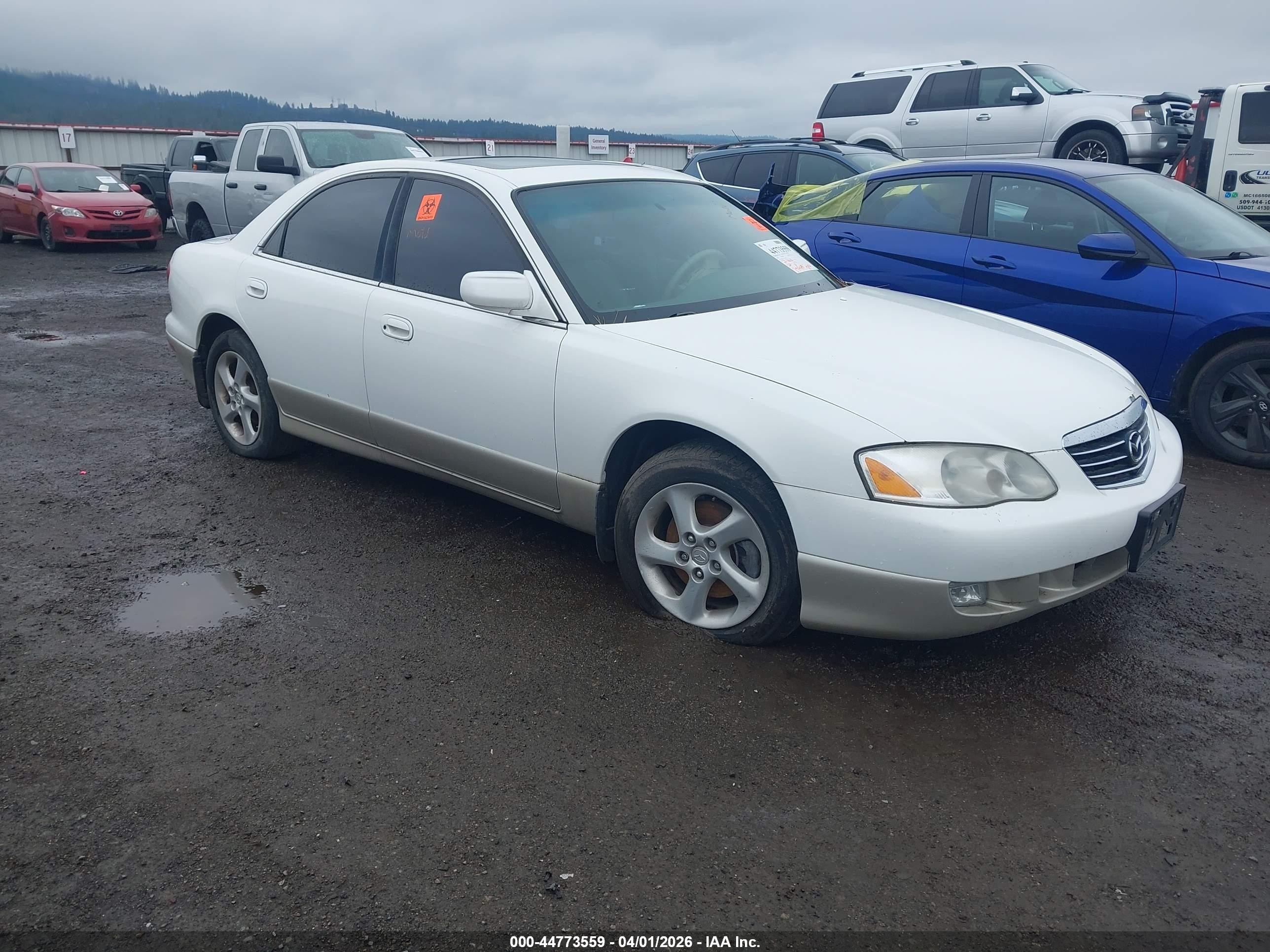2002 Mazda Millenia P, VIN JM1TA221721732148 — Biohazard / chemical