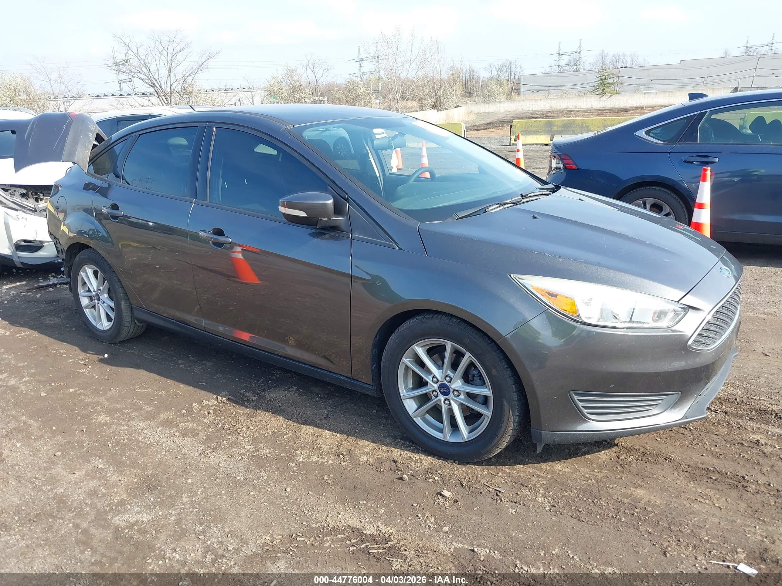 2015 Ford Focus SE, VIN 1FADP3F2XFL213672 — Rear end