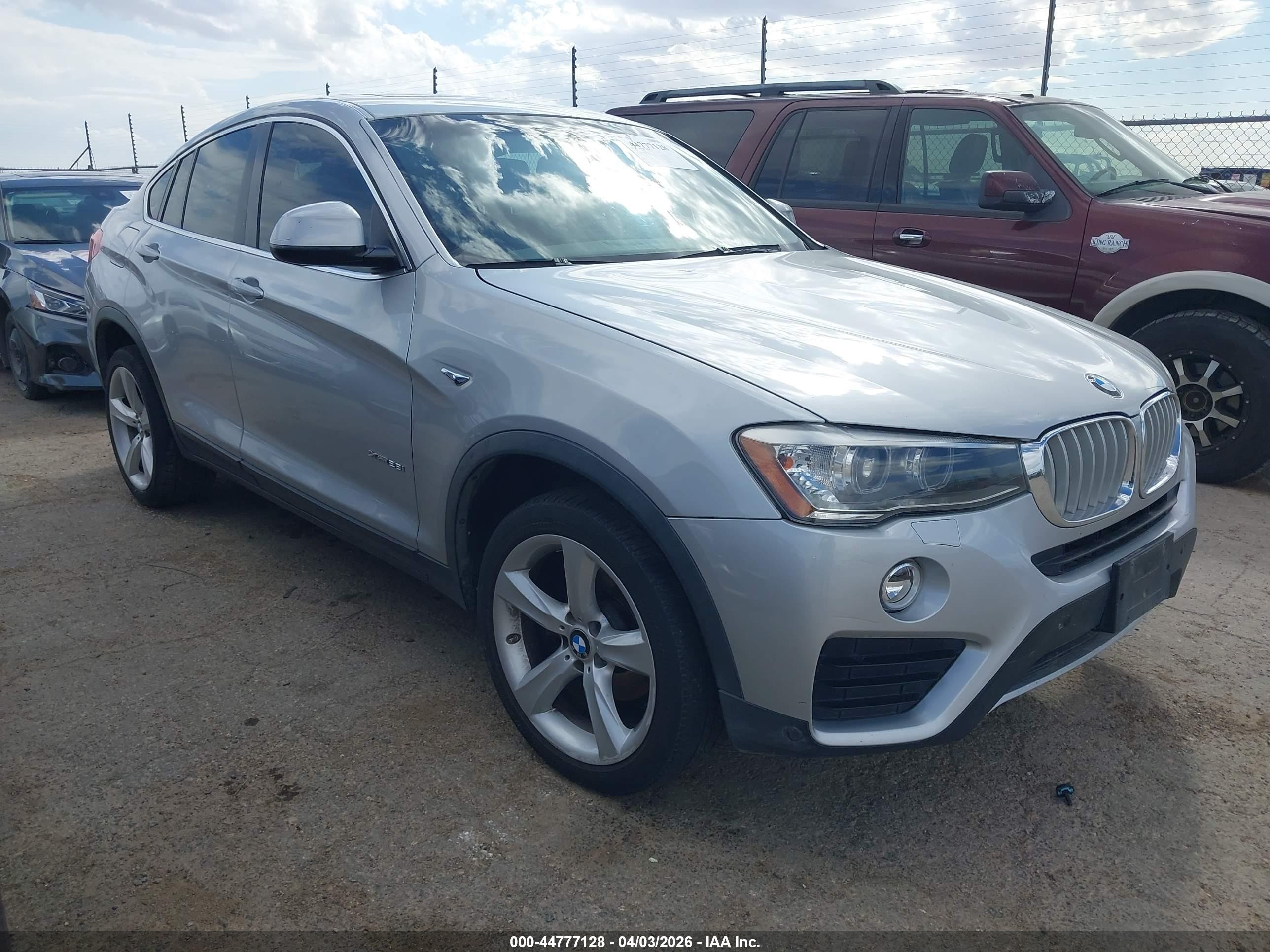 2017 BMW X4 xDrive28i, VIN 5UXXW3C30H0T79502 — Side