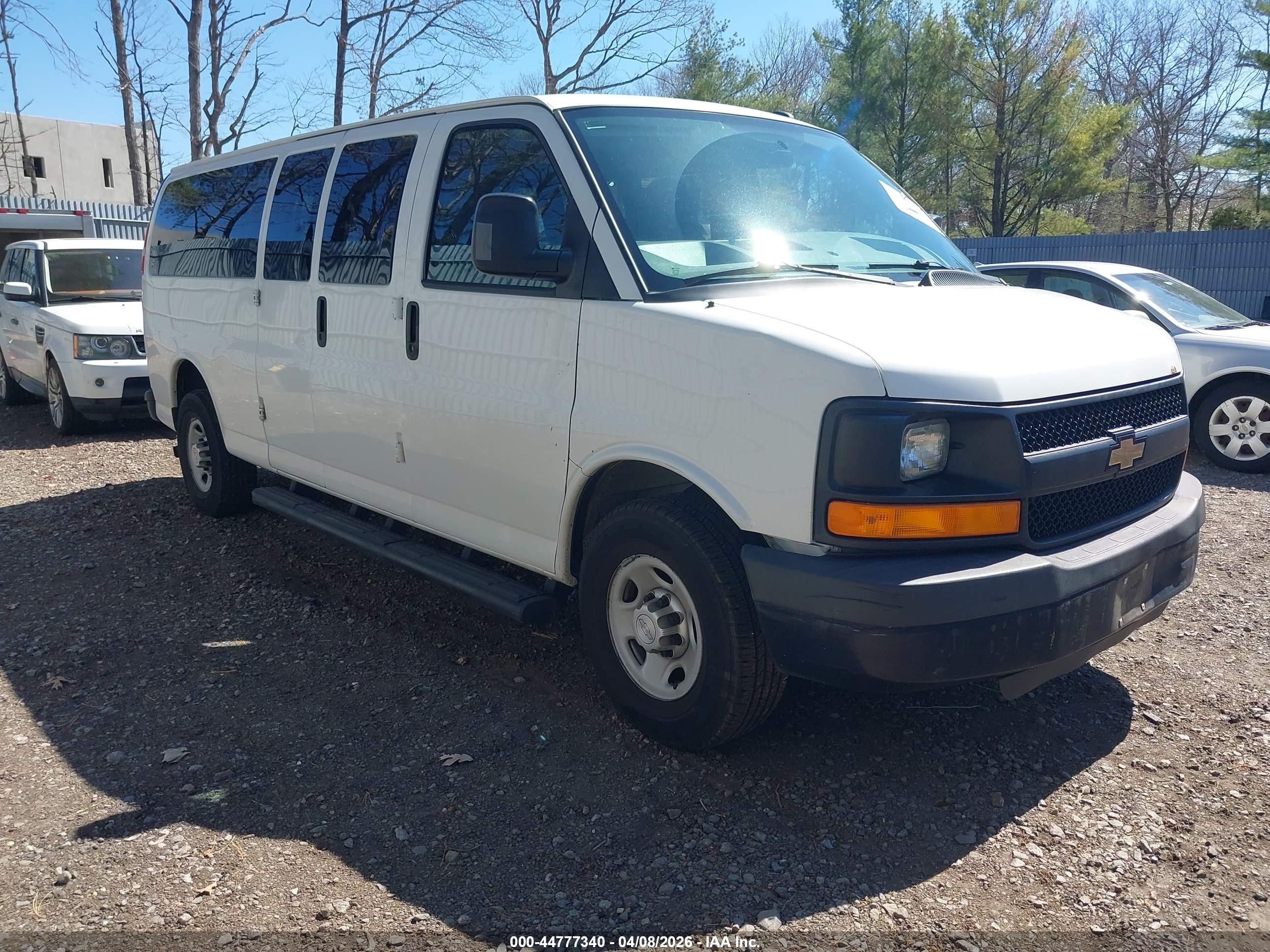 2015 Chevrolet Express Passenger 1LS, VIN 1GAZGZFG7F1126475 — Rear end