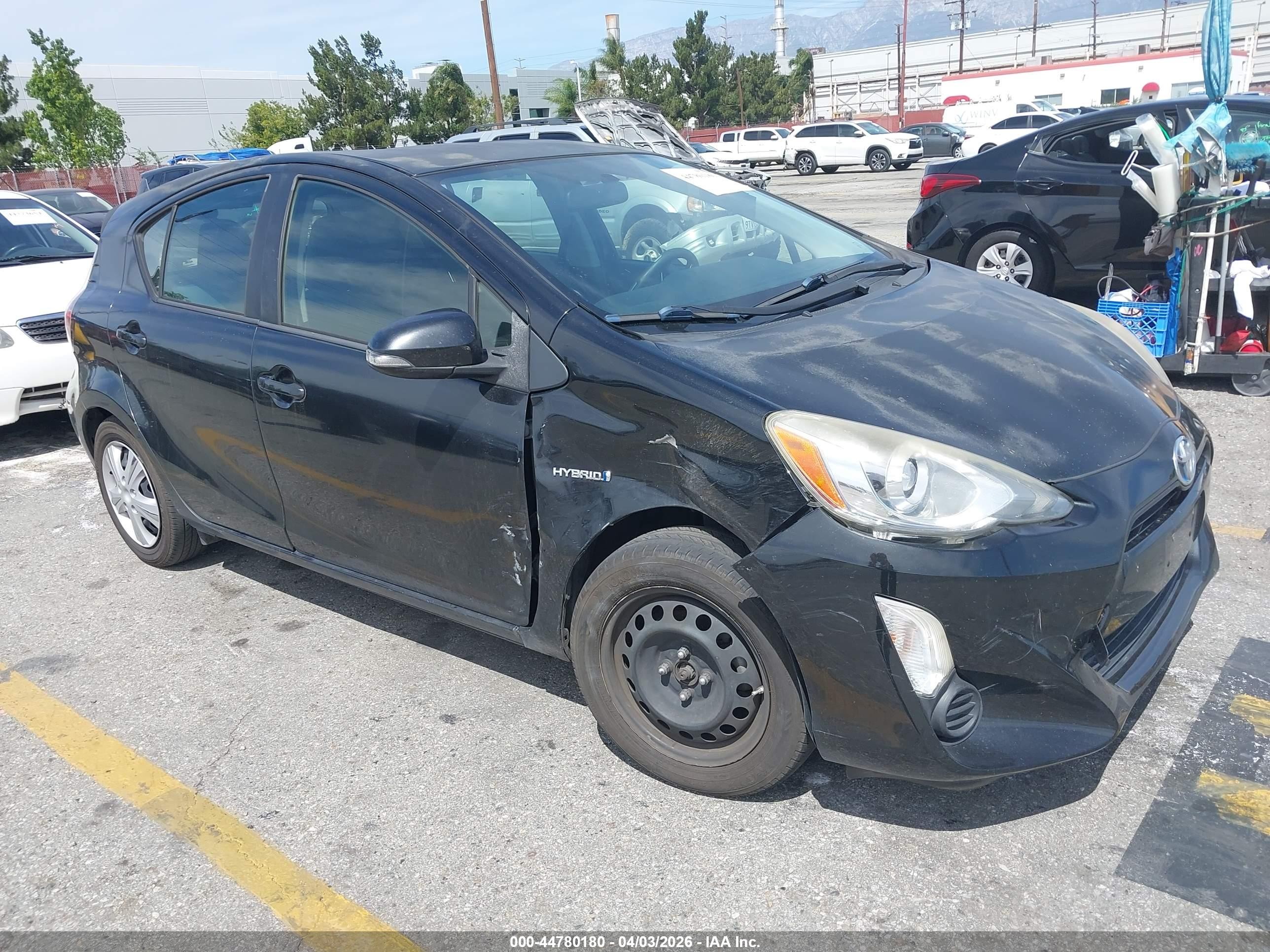 2015 Toyota Prius One, VIN JTDKDTB38F1579490 — Side