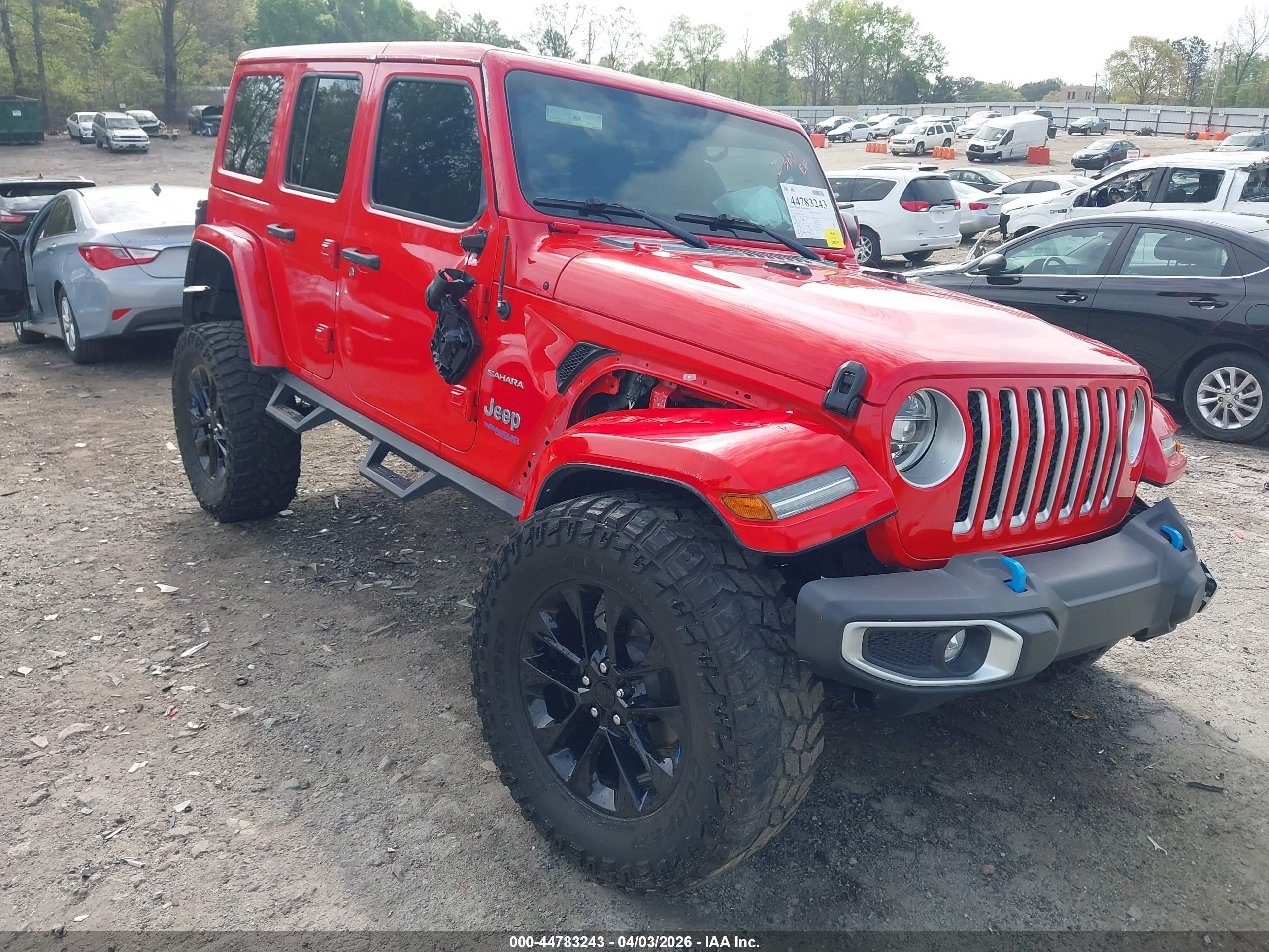2022 Jeep Wrangler Unlimited Sahara, VIN 1C4JJXP66NW214077 — Side