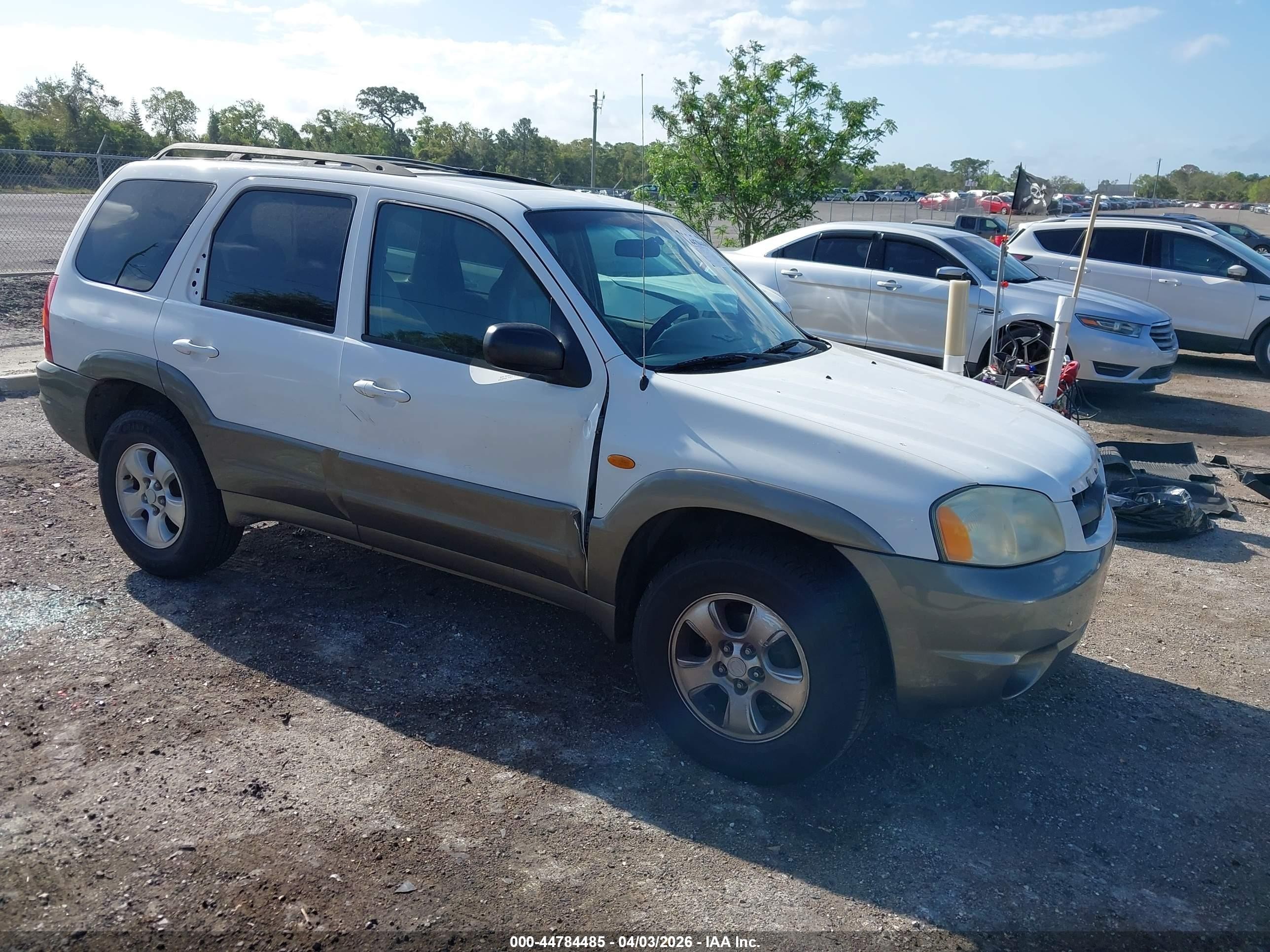 2001 Mazda Tribute LX, VIN 4F2CU09171KM05663 — Бок