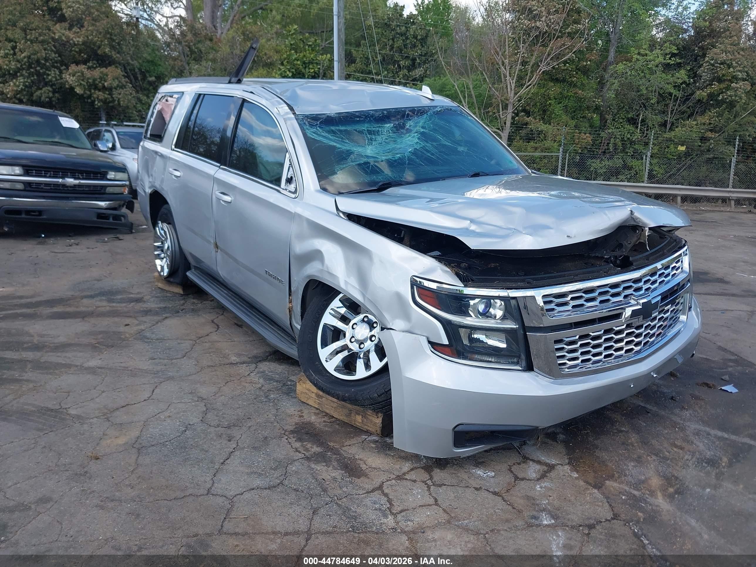 2017 Chevrolet Tahoe LS, VIN 1GNSCAKCXHR180910 — Rollover
