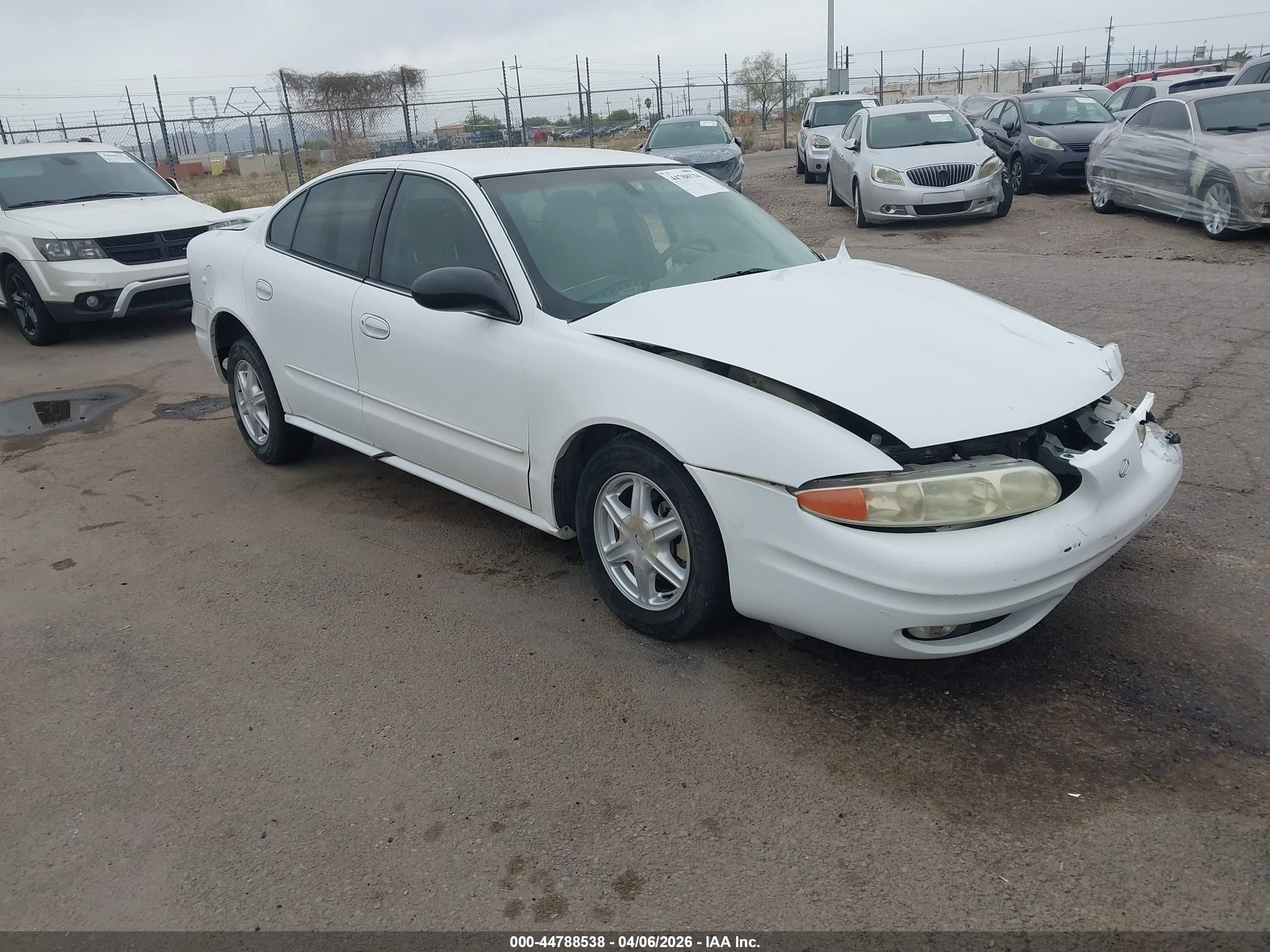 2003 Oldsmobile Alero GL1, VIN 1G3NL52FX3C311322 — Side