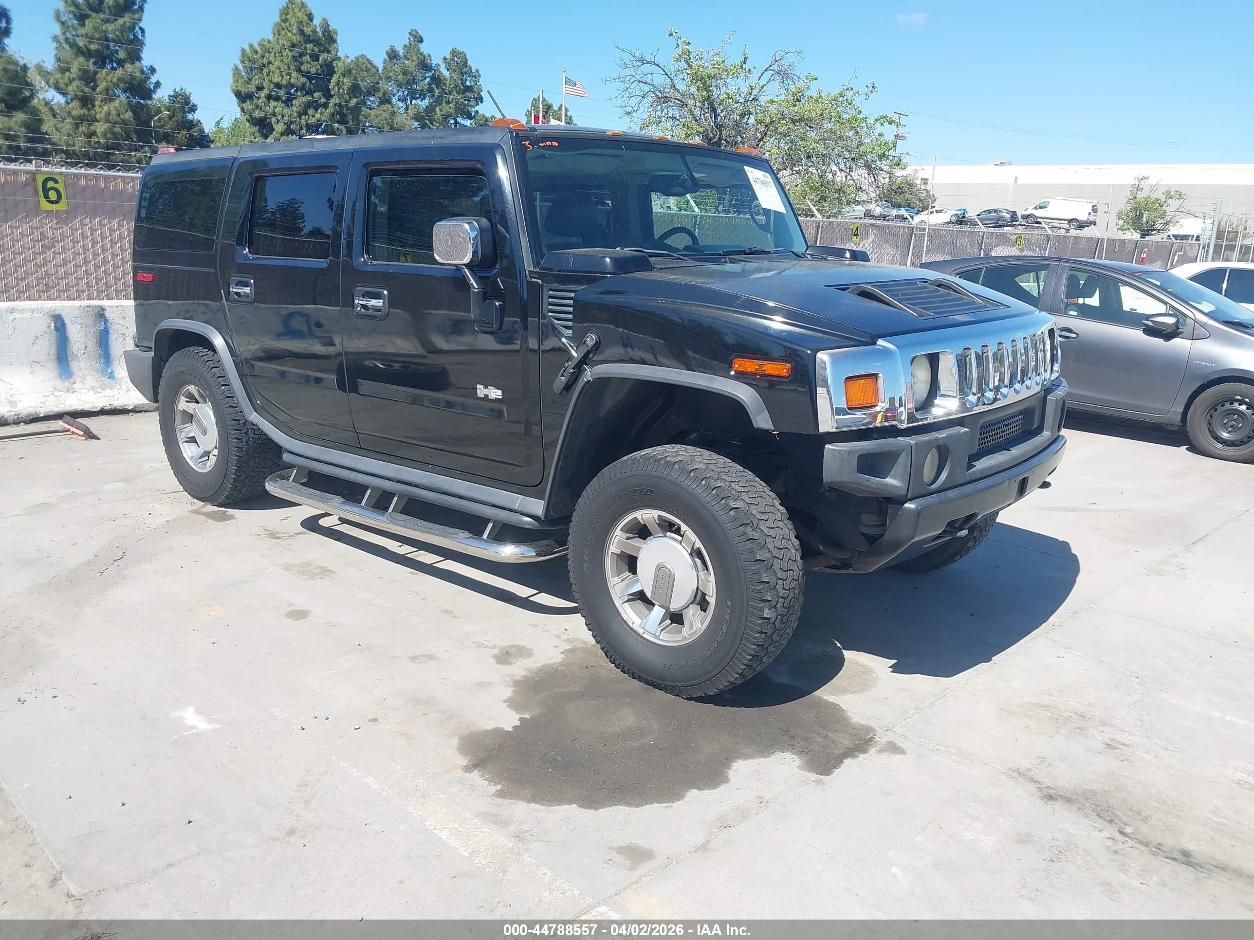 2003 Hummer H2, VIN 5GRGN23U83H103214 — Rear end