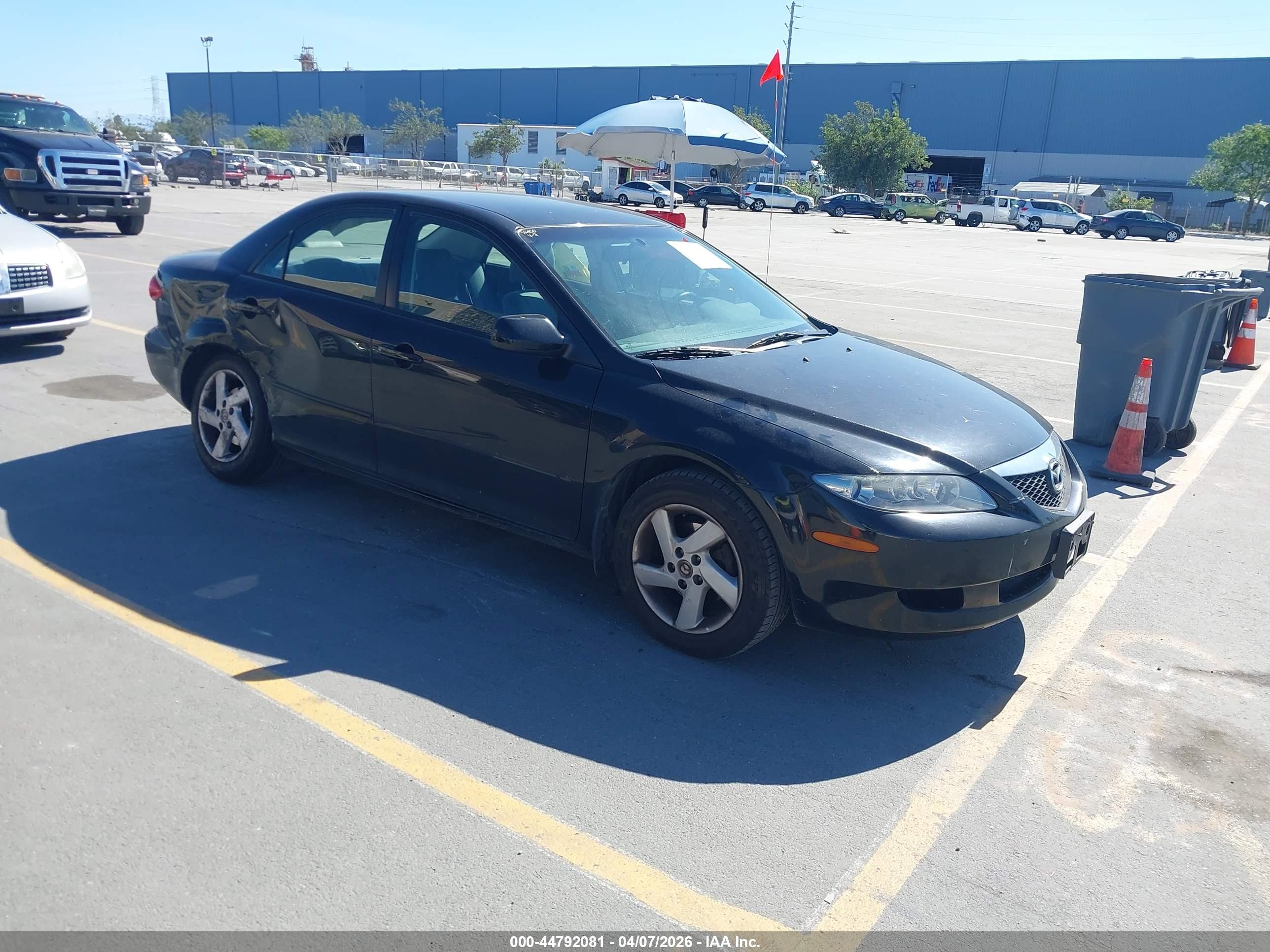 2003 Mazda 6 i, VIN 1YVFP80CX35M37276 — Side