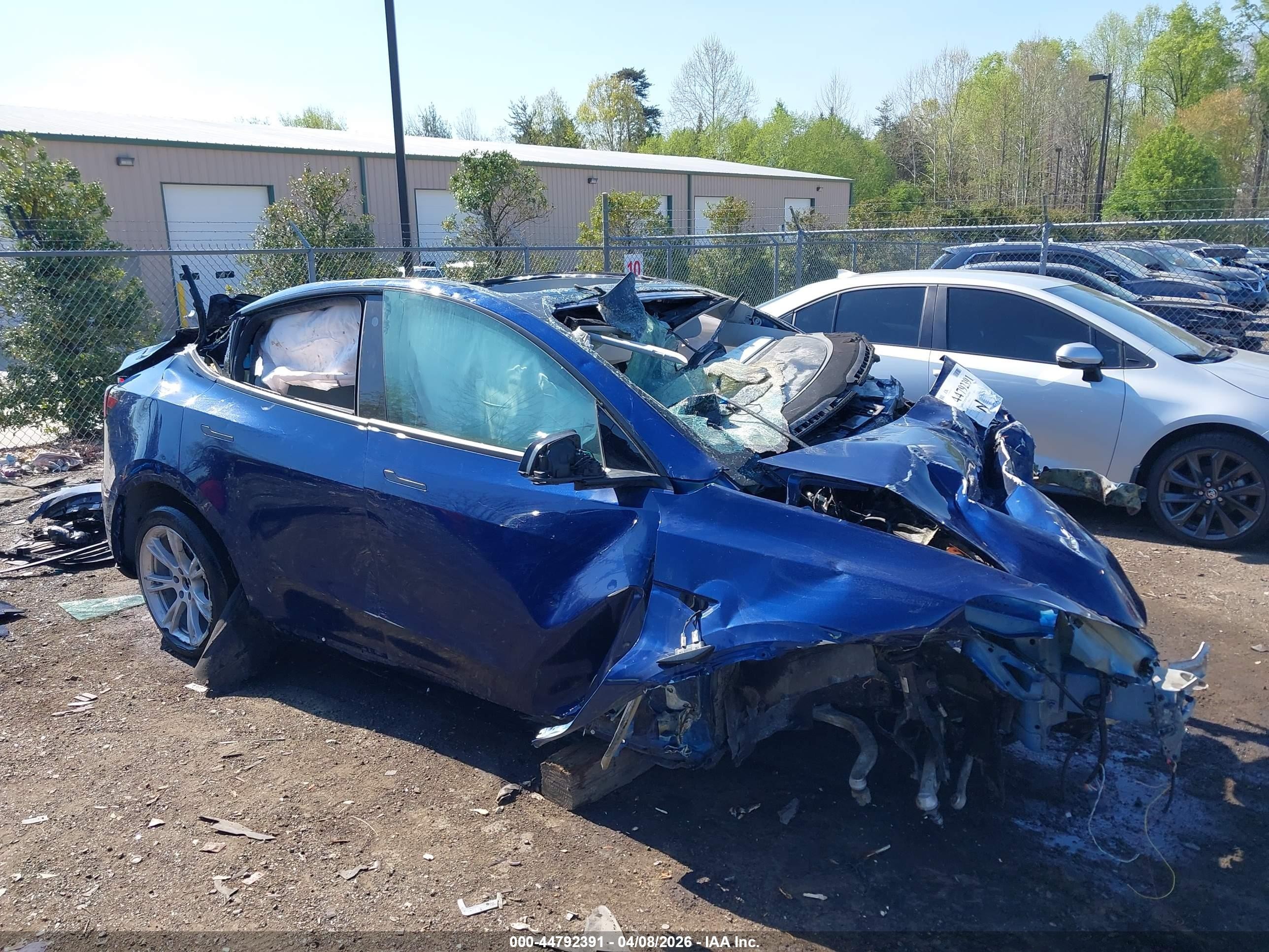 2022 Tesla Model Y Long Range, VIN 7SAYGDEE6NF395310 — Rollover