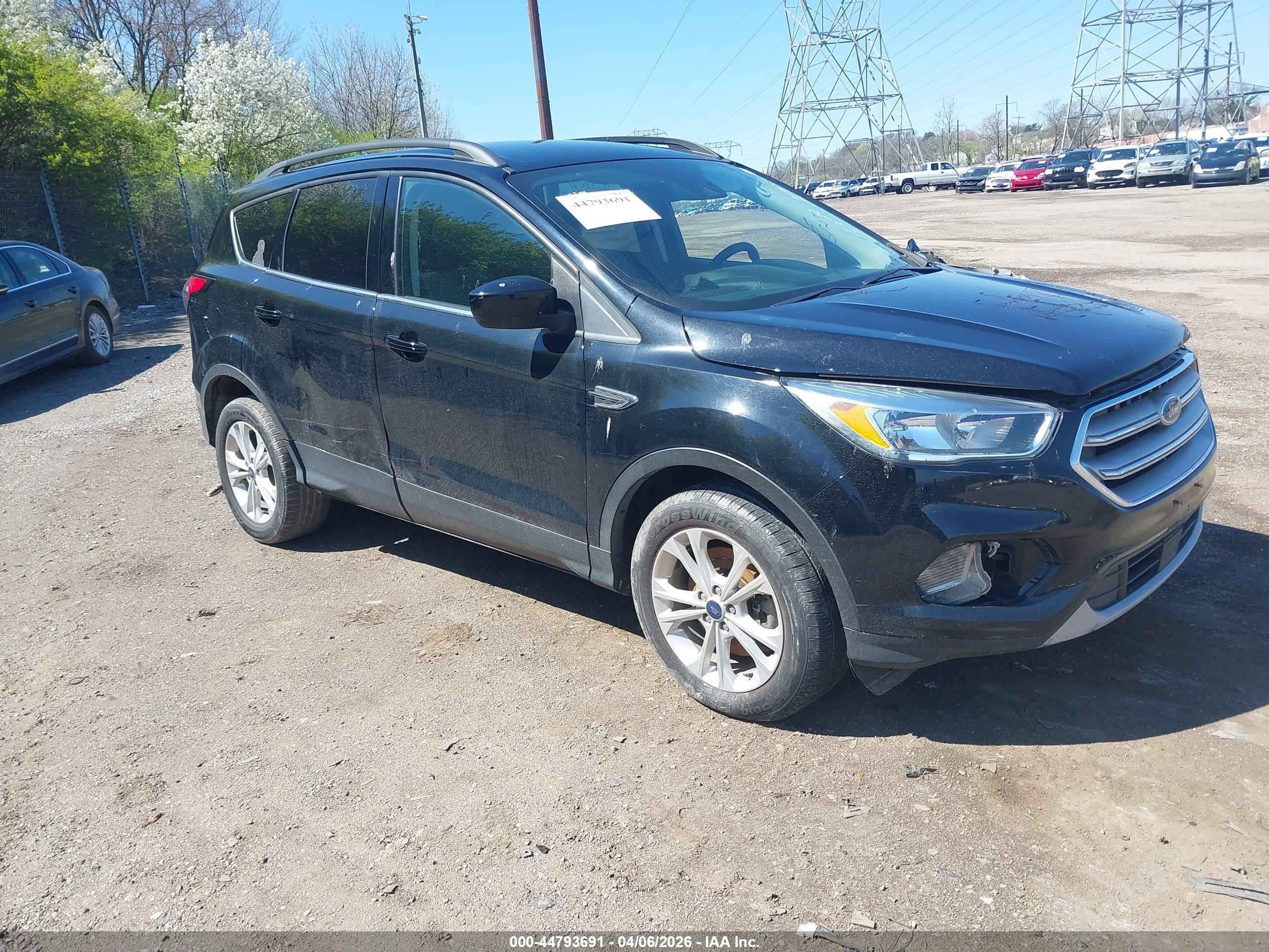2018 Ford Escape SE, VIN 1FMCU9GD1JUD11974 — Side