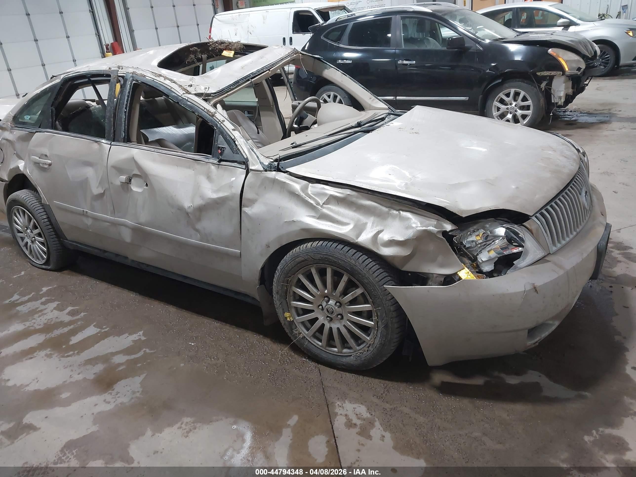 2006 Mercury Montego Premier, VIN 1MEFM43136G609964 — Rollover
