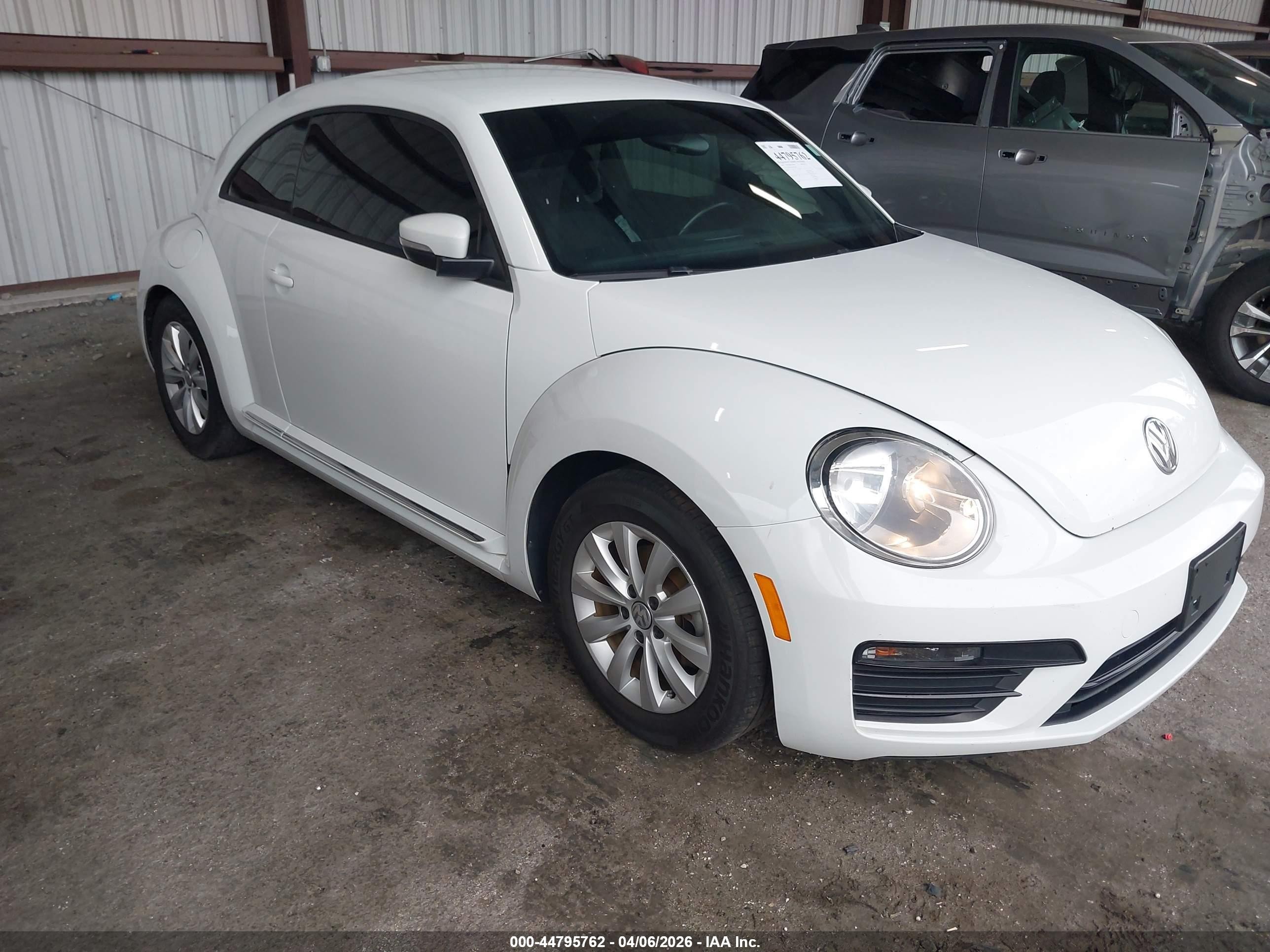 2019 Volkswagen Beetle S, VIN 3VWFD7AT5KM711061 — Rear end