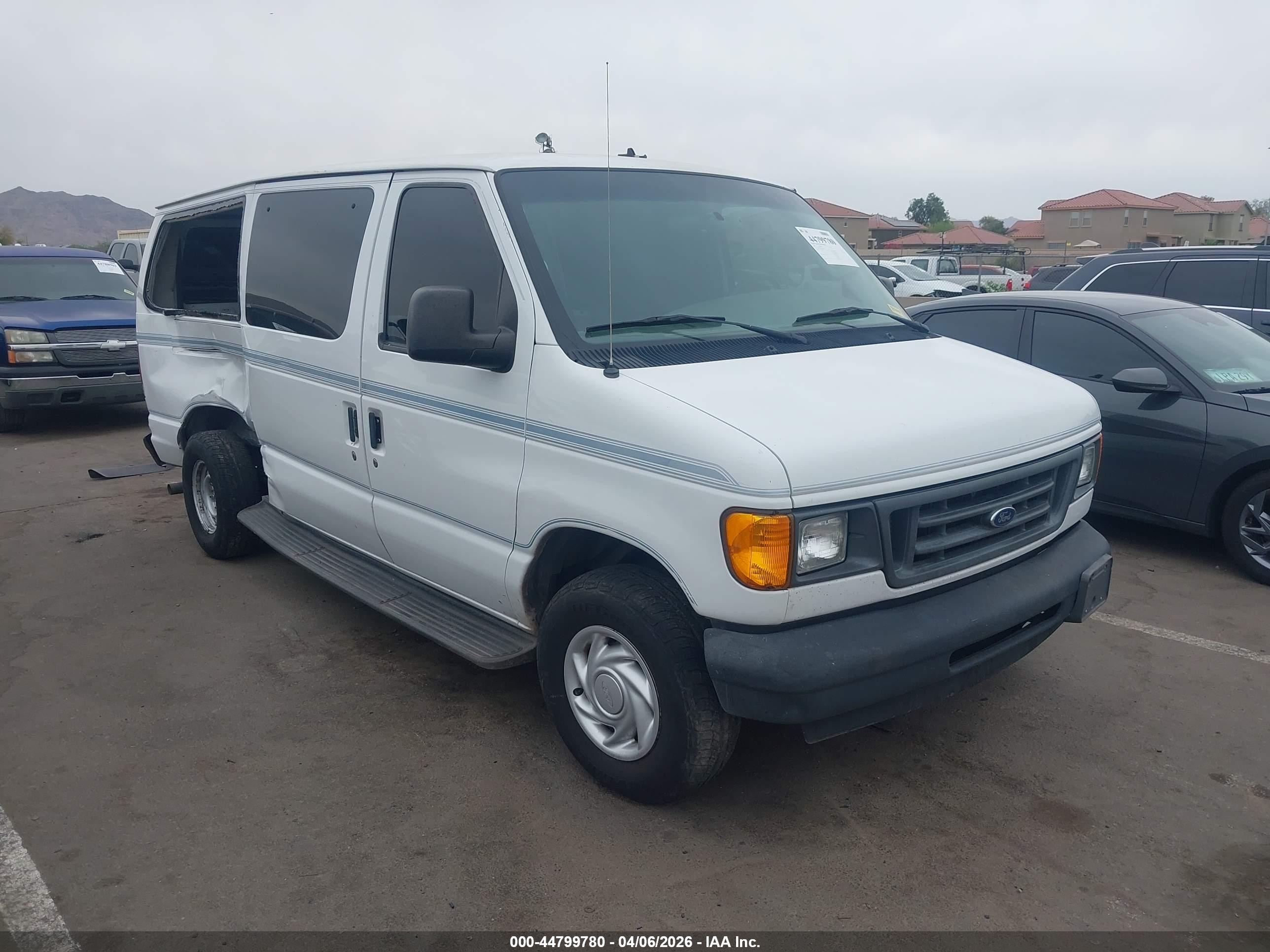 2003 Ford E-150, VIN 1FTRE14L63HA99464 — Side