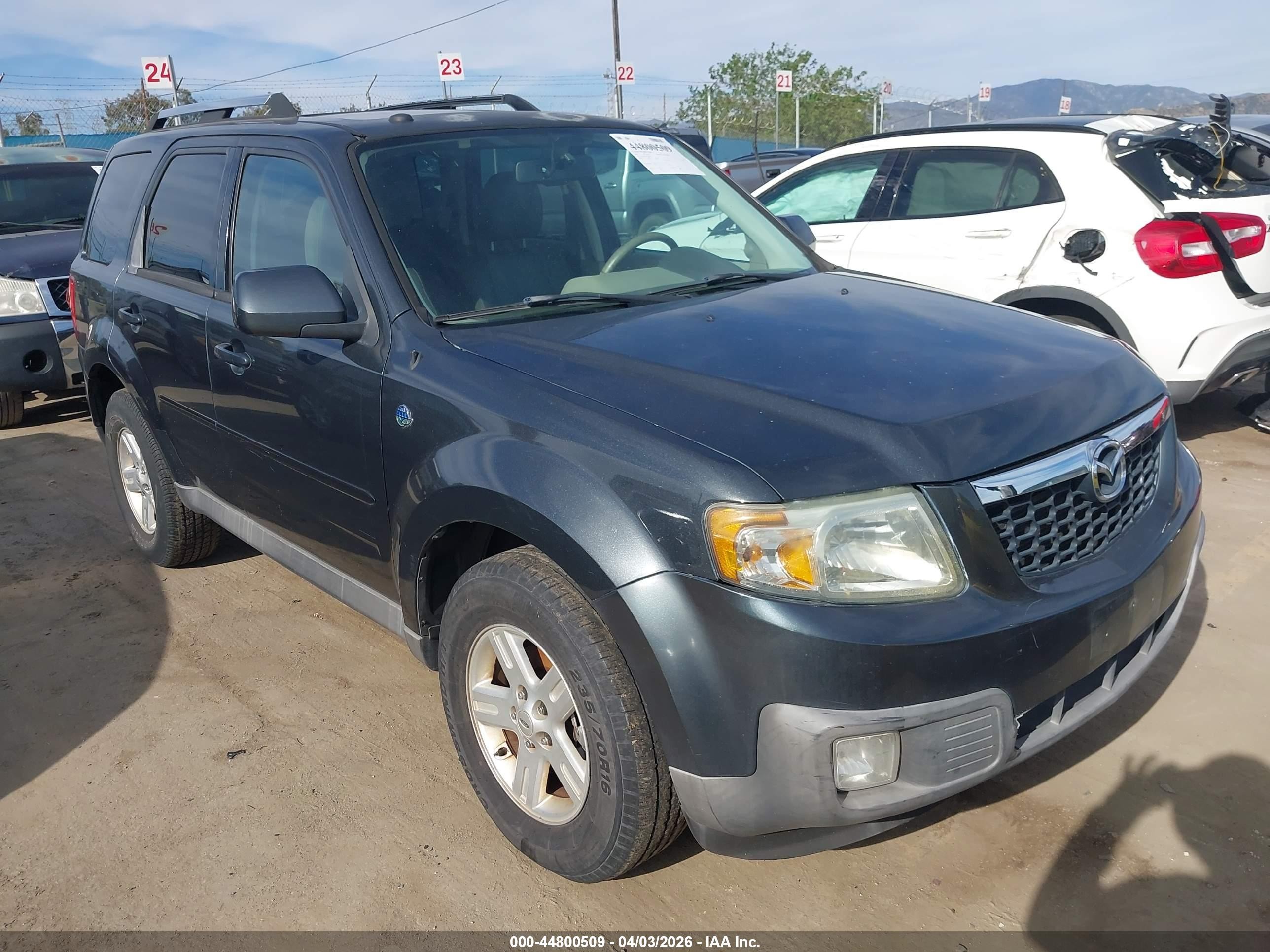 2009 Mazda Tribute Grand Touring, VIN 4F2CZ59329KM05565 — Normal wear
