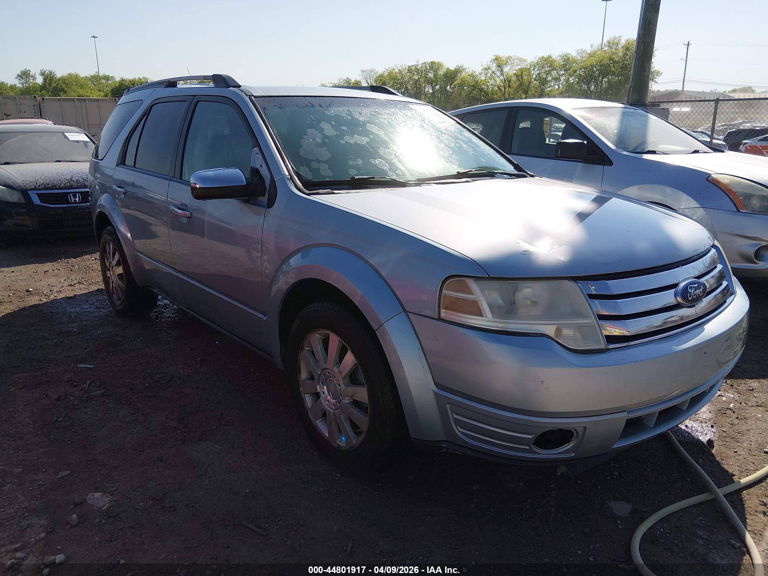 2008 Ford Taurus X Limited, VIN 1FMDK03W58GA09321 — Side