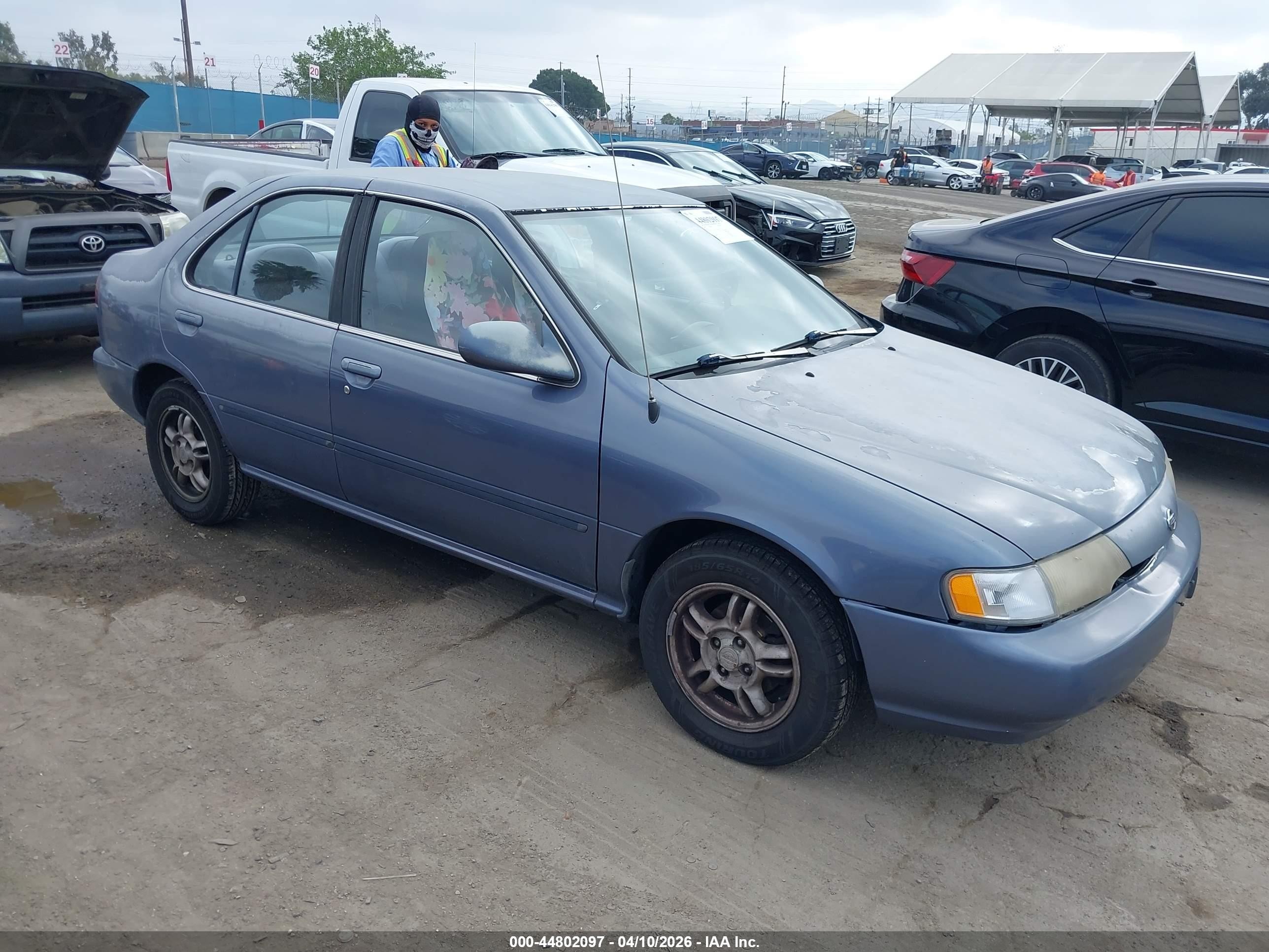 1999 Nissan Sentra XE, VIN 3N1AB41D4XL112355 — Обычный износ
