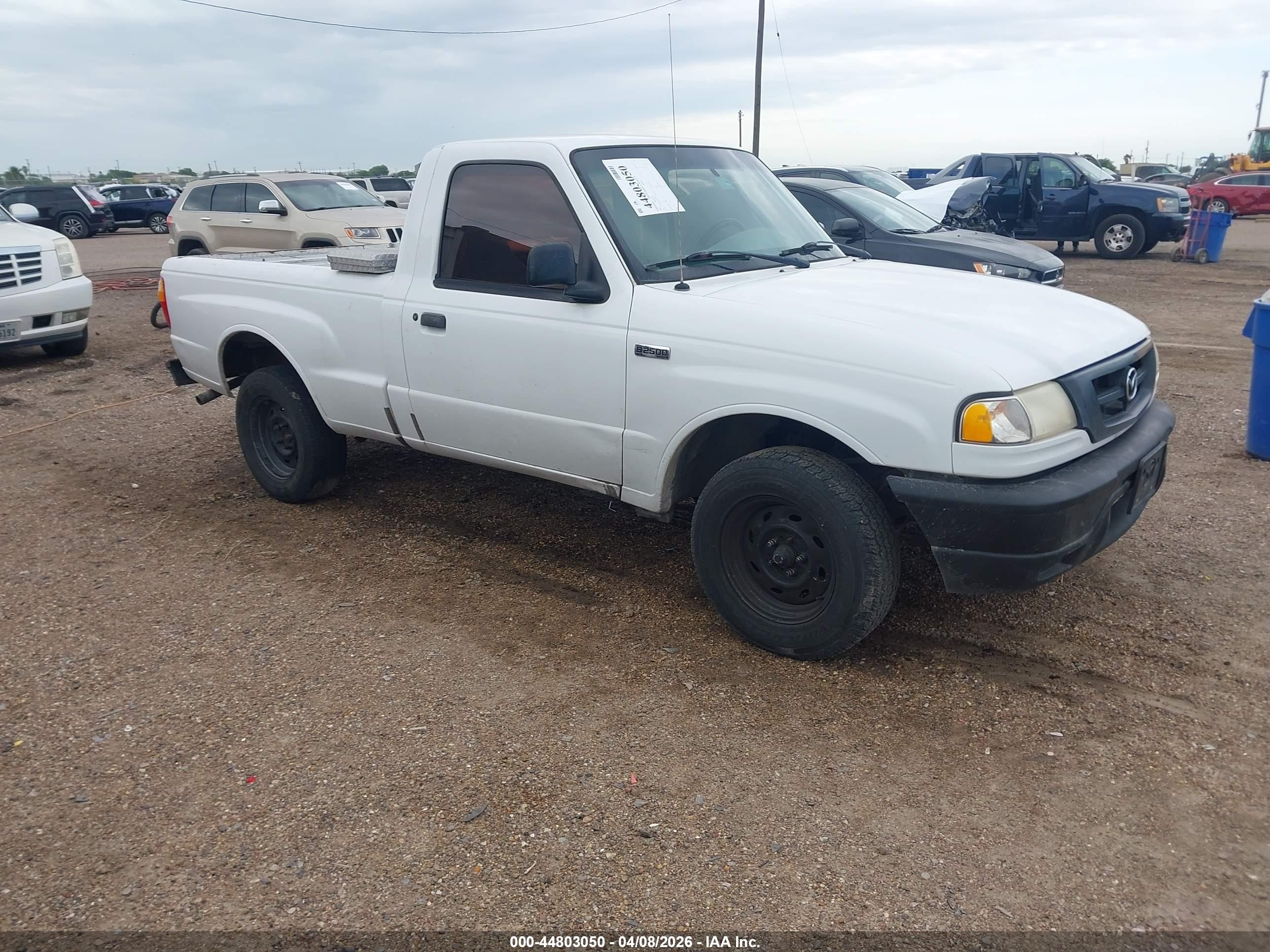 2001 Mazda B-Series SX, VIN 4F4YR12C21TM04379 — Обычный износ