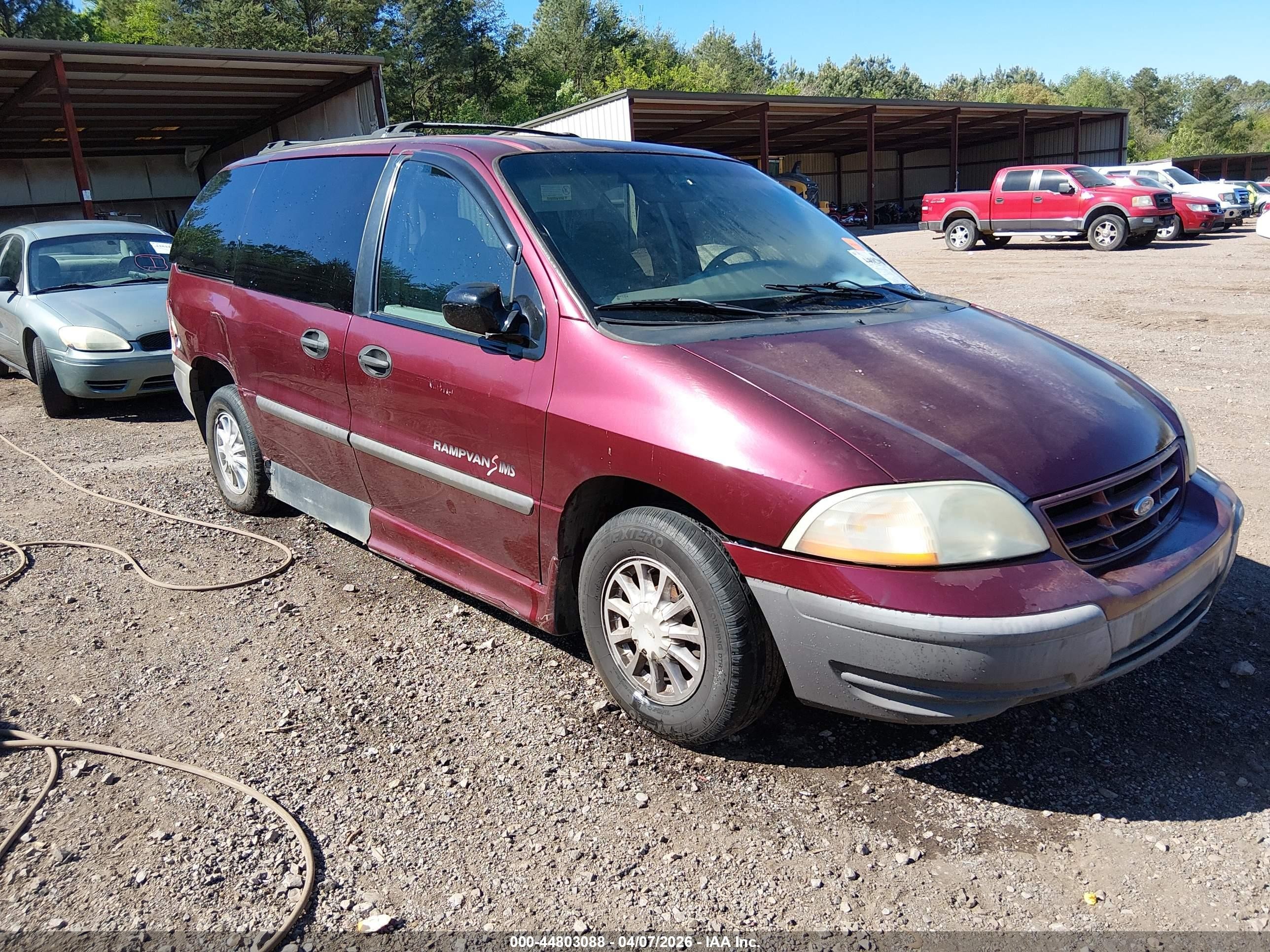 1999 Ford Windstar LX, VIN 2FMZA5142XBC00921 — Side