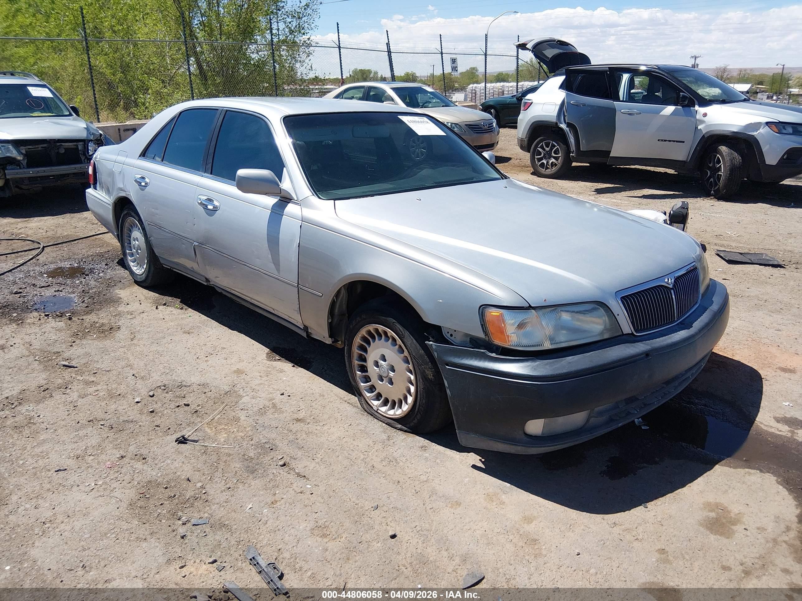 1998 Infiniti Q45, VIN JNKBY31AXWM403428 — Side